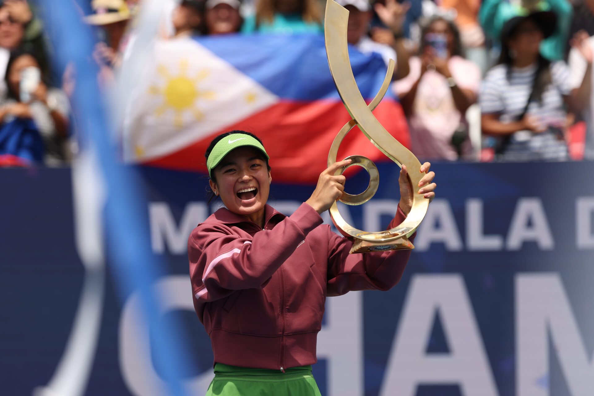 Alexandra Eala (PHI) celebrates with the championship trophy after her match against Jessica Pegula (USA) (not pictured) in the women's singles final of the 2026 Mubadala DC Open at Rock Creek Park Tennis Center.