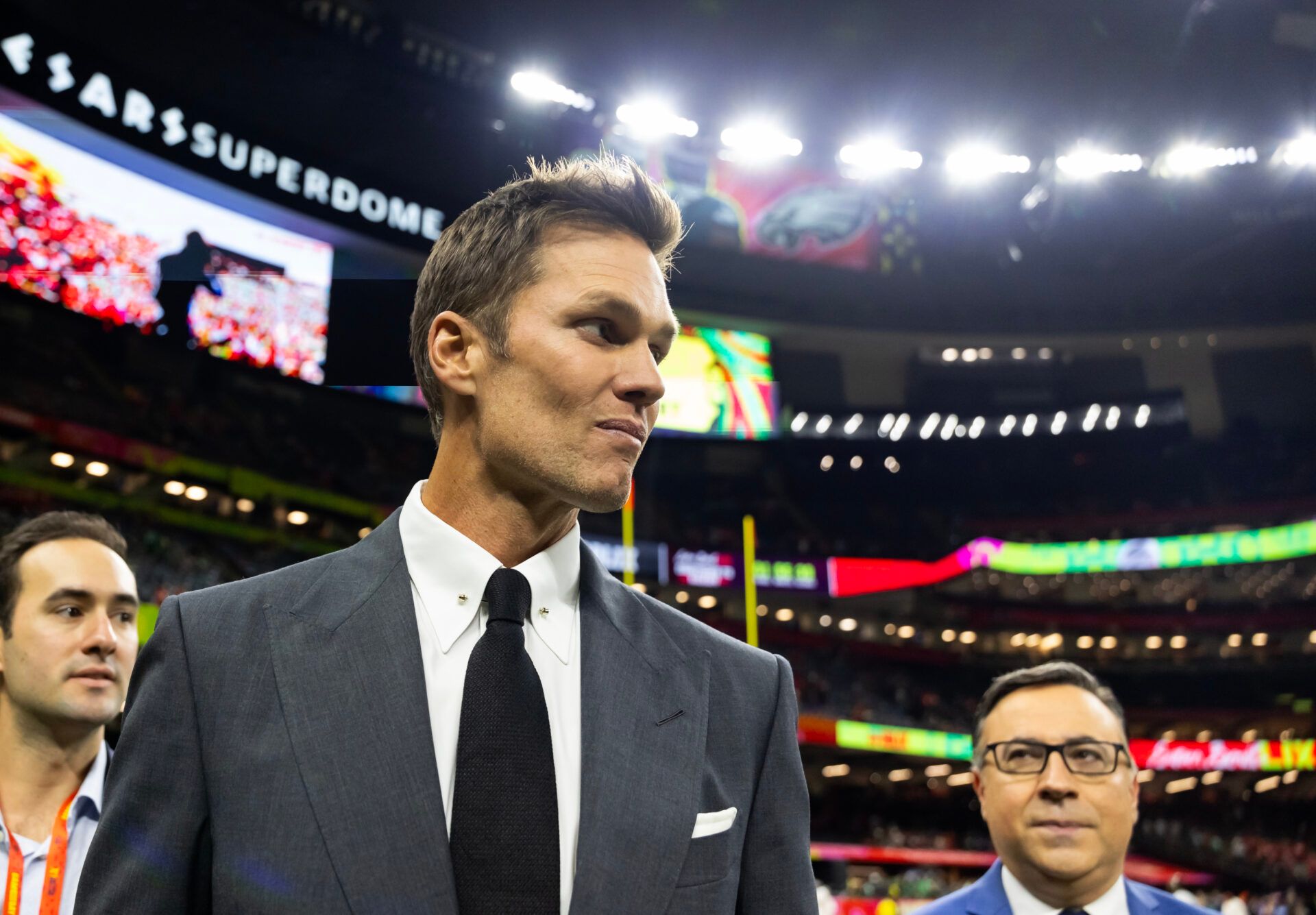 Fox Sports announcer Tom Brady on the field before Super Bowl LIX between the Philadelphia Eagles and the Kansas City Chiefs at Ceasars Superdome.