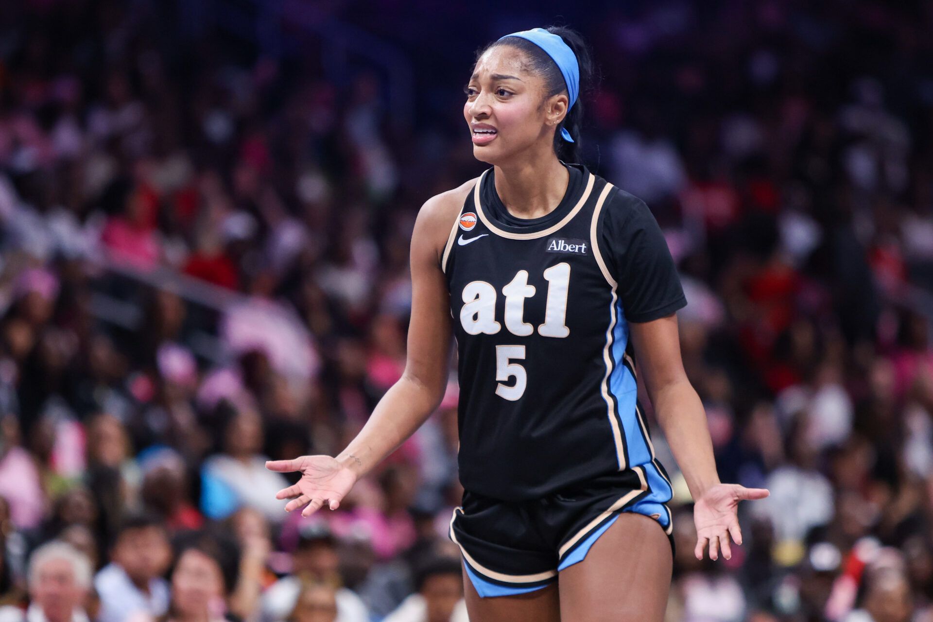 Atlanta Dream forward Angel Reese (5) reacts after a play against the Las Vegas Aces in the third quarter at State Farm Arena.