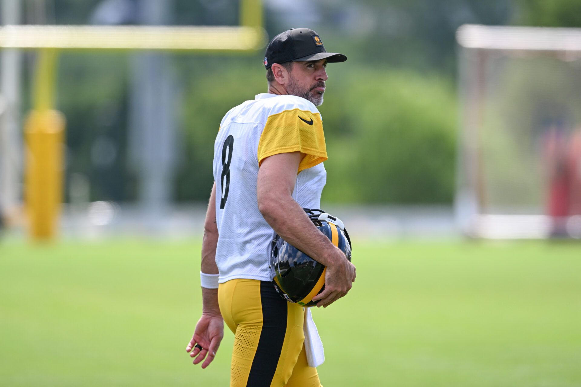 Pittsburgh Steelers quarterback Aaron Rodgers (8) takes the field for a practice session at Training camp at Saint Vincent College.