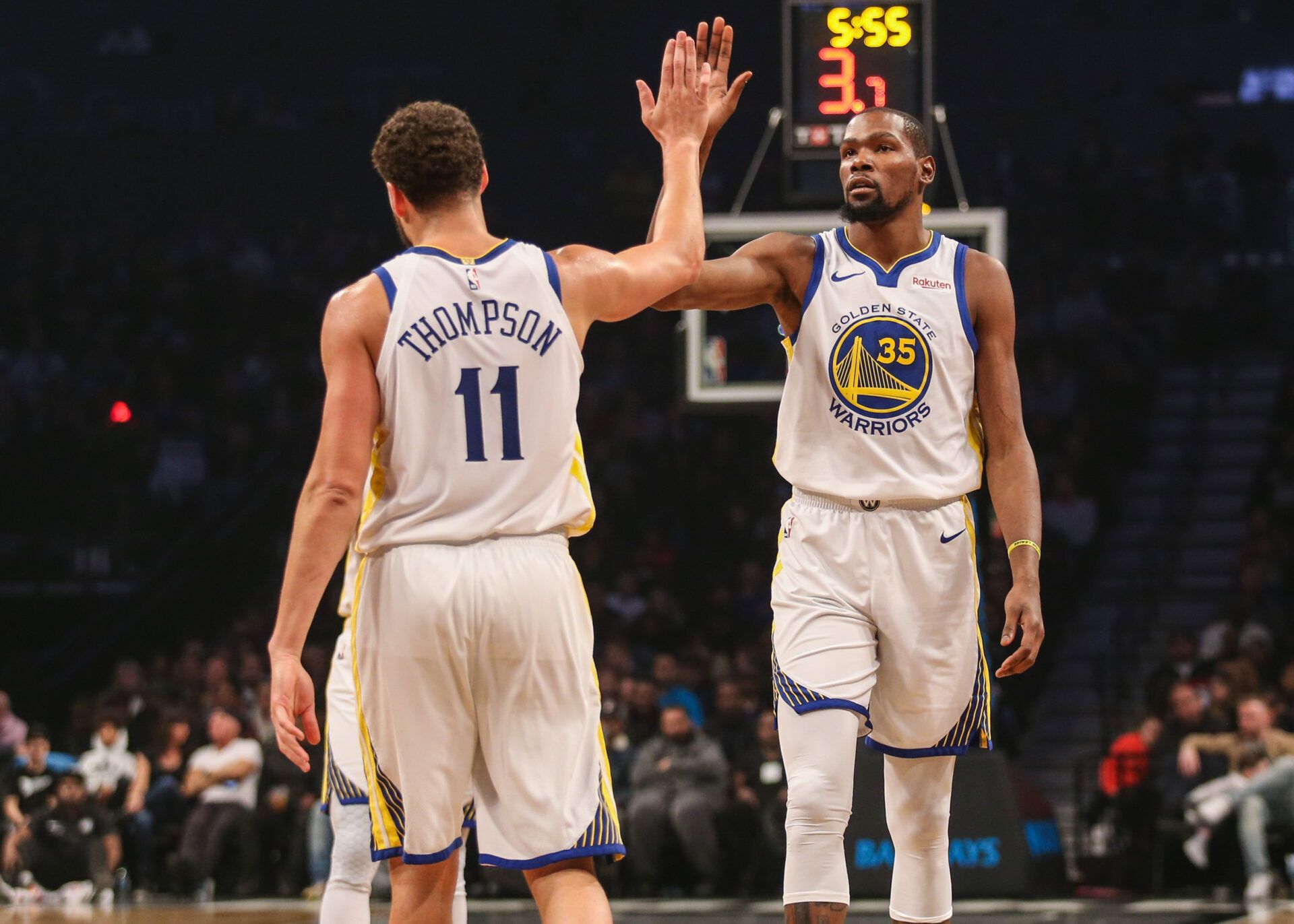 Golden State Warriors guard Klay Thompson (11) and forward Kevin Durant (35) at Barclays Center.