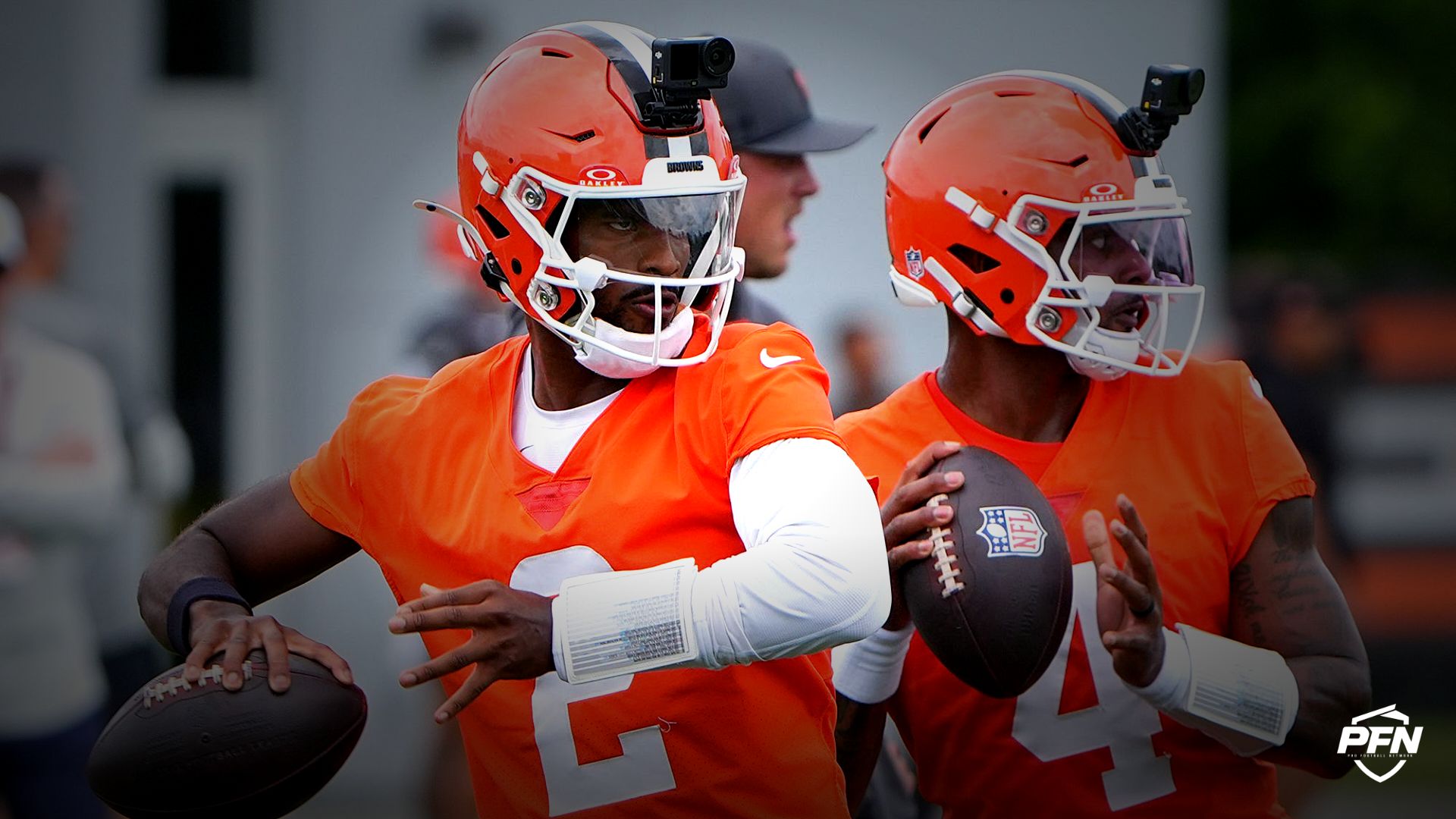 Cleveland Browns quarterbacks Shedeur Sanders and Deshaun Watson take part in a drill on the first day of minicamp at CrossCountry Mortgage Campus of the Cleveland Browns in Berea, Ohio on June 9, 2026.
