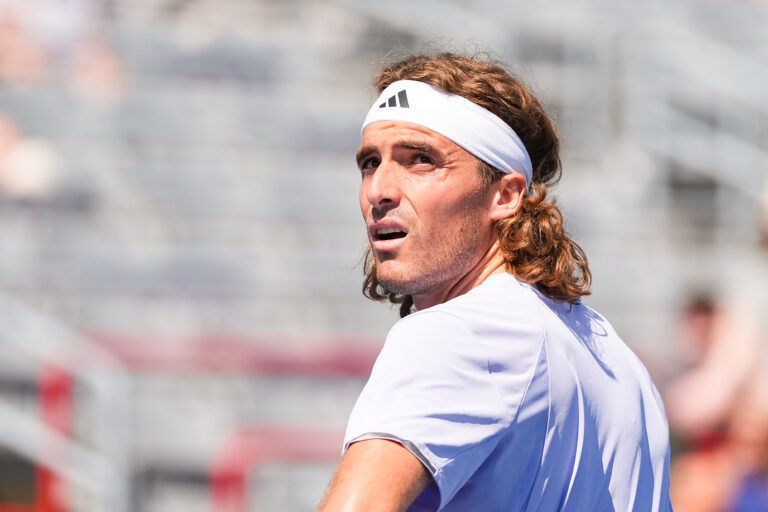 Stefanos Tsitsipas (GRE) looks on against Martin Damm (USA) in first round play at IGA Stadium.