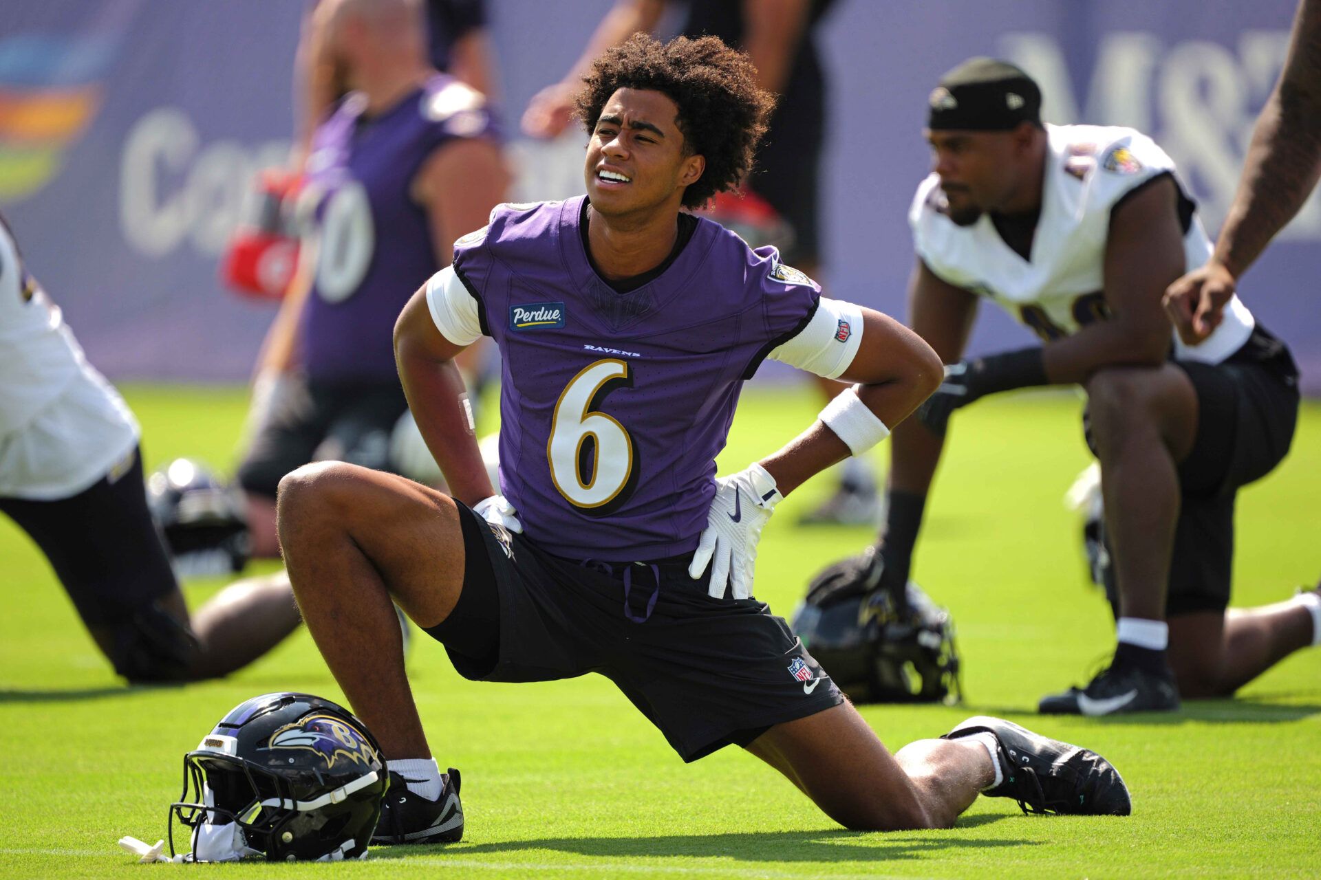 Baltimore Ravens wide receiver Ja’Kobi Lane (6) stretches during practice at the Under Armour Performance Center.