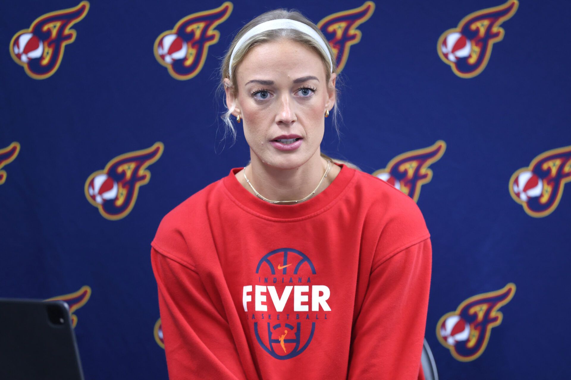 Indiana Fever guard Sophie Cunningham (8) speaks at a press conference before a game against the Portland Fire at Moda Center.