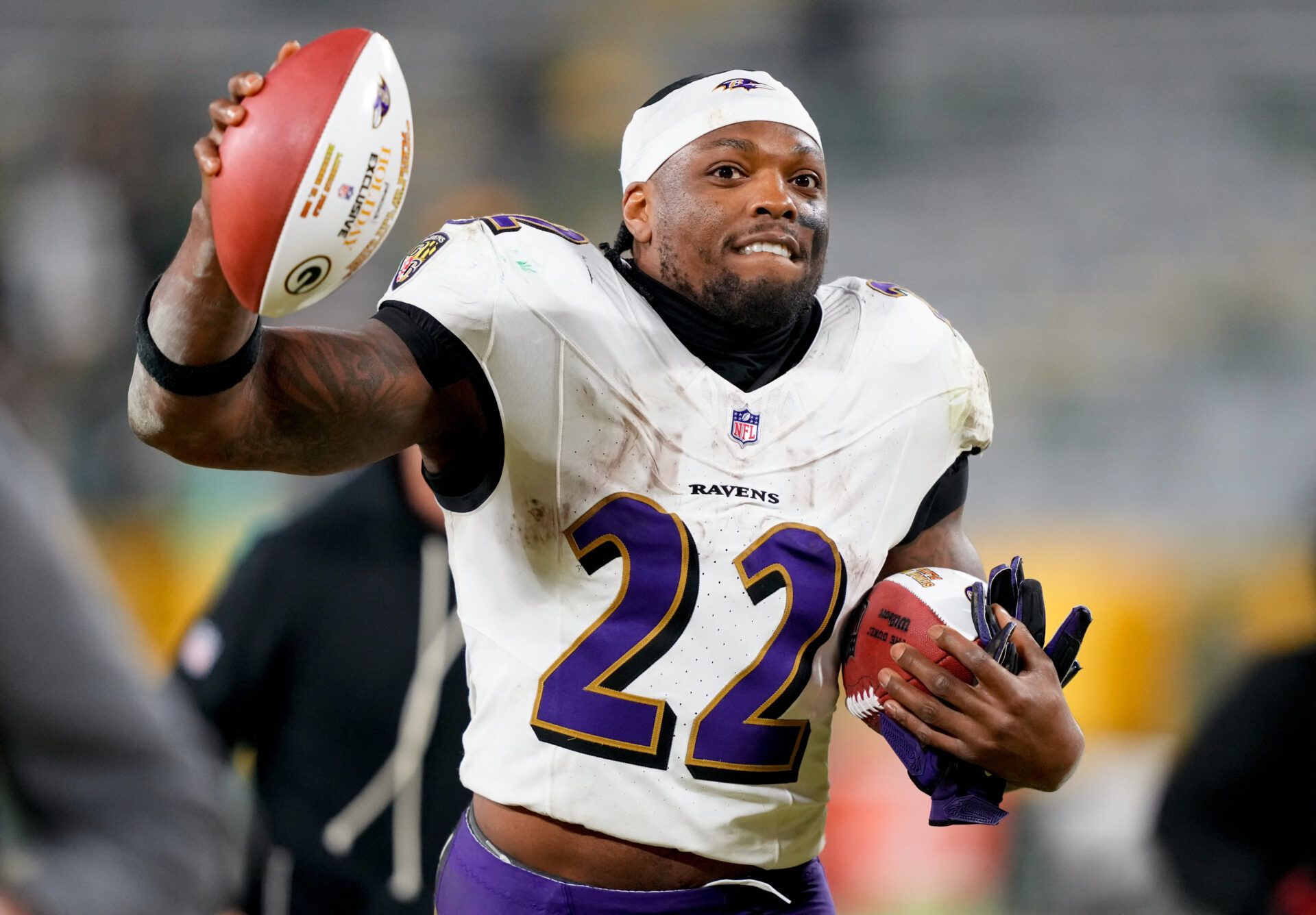 Baltimore Ravens running back Derrick Henry (22) celebrates after the game against the Green Bay Packers at Lambeau Field.