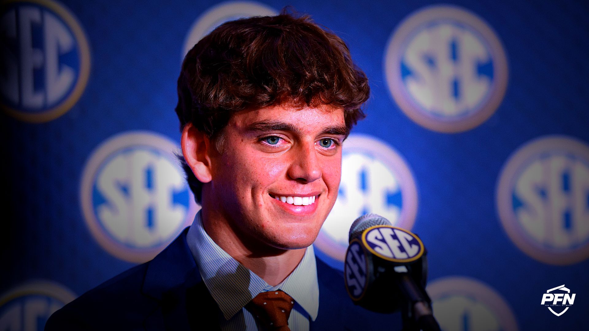 Texas Longhorns quarterback Arch Manning (16) speaks to the press during SEC Football Kickoff Media Day at the Tampa Marriott.