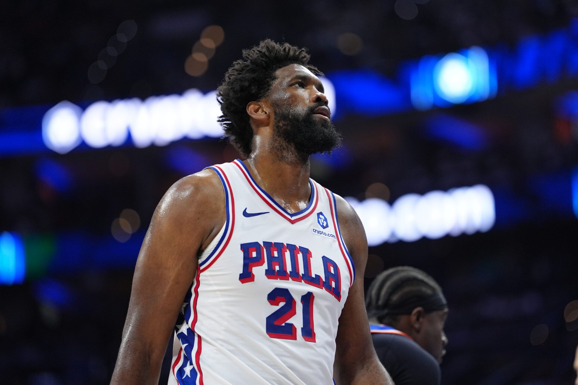 Philadelphia 76ers center Joel Embiid (21) looks on against the New York Knicks in the second quarter during game four of the second round of the 2026 NBA Playoffs at Xfinity Mobile Arena.