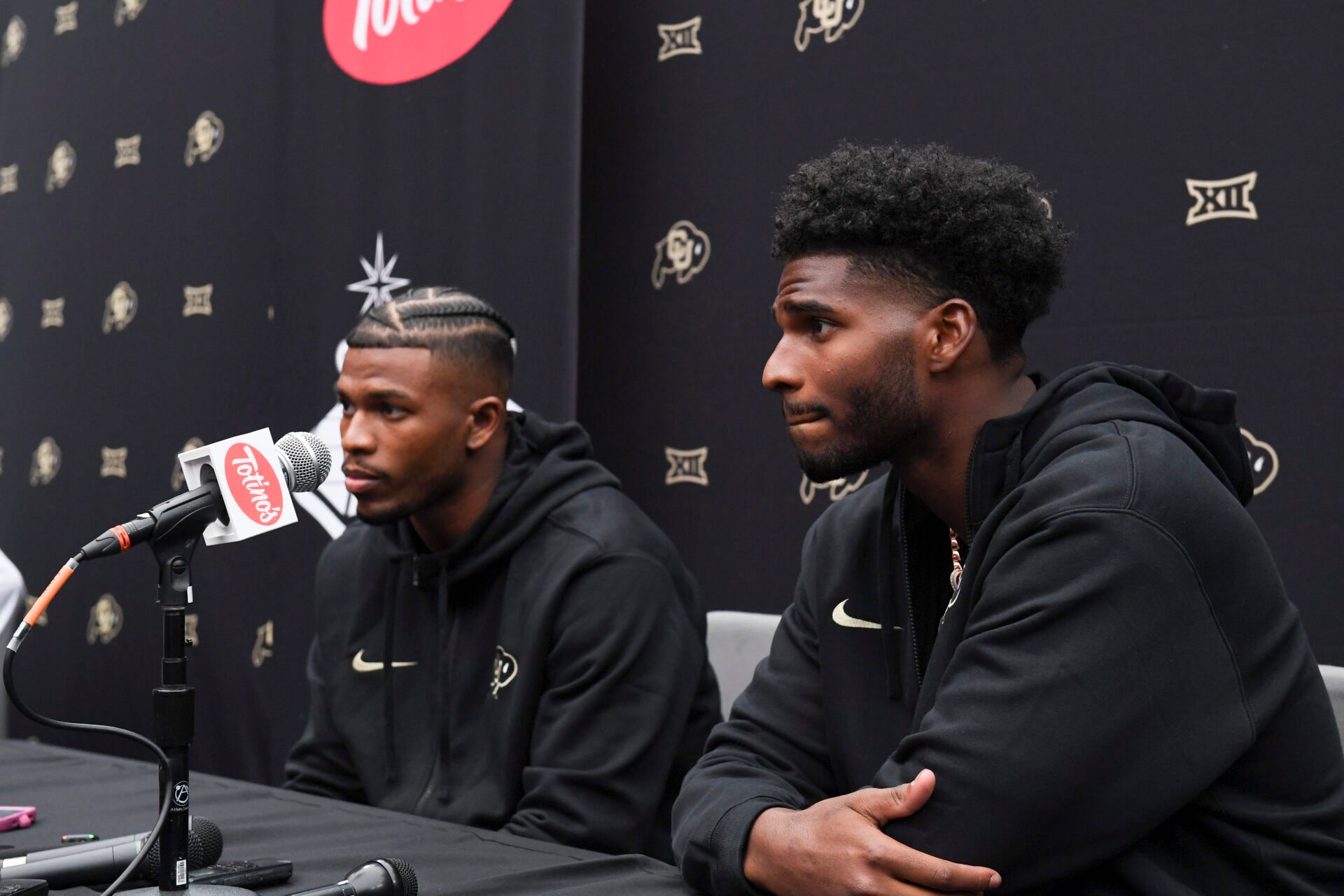Colorado Buffaloes safety Shilo Sanders and quarterback Shedeur Sanders speak to the media during the Big 12 Media Days at Allegiant Stadium.