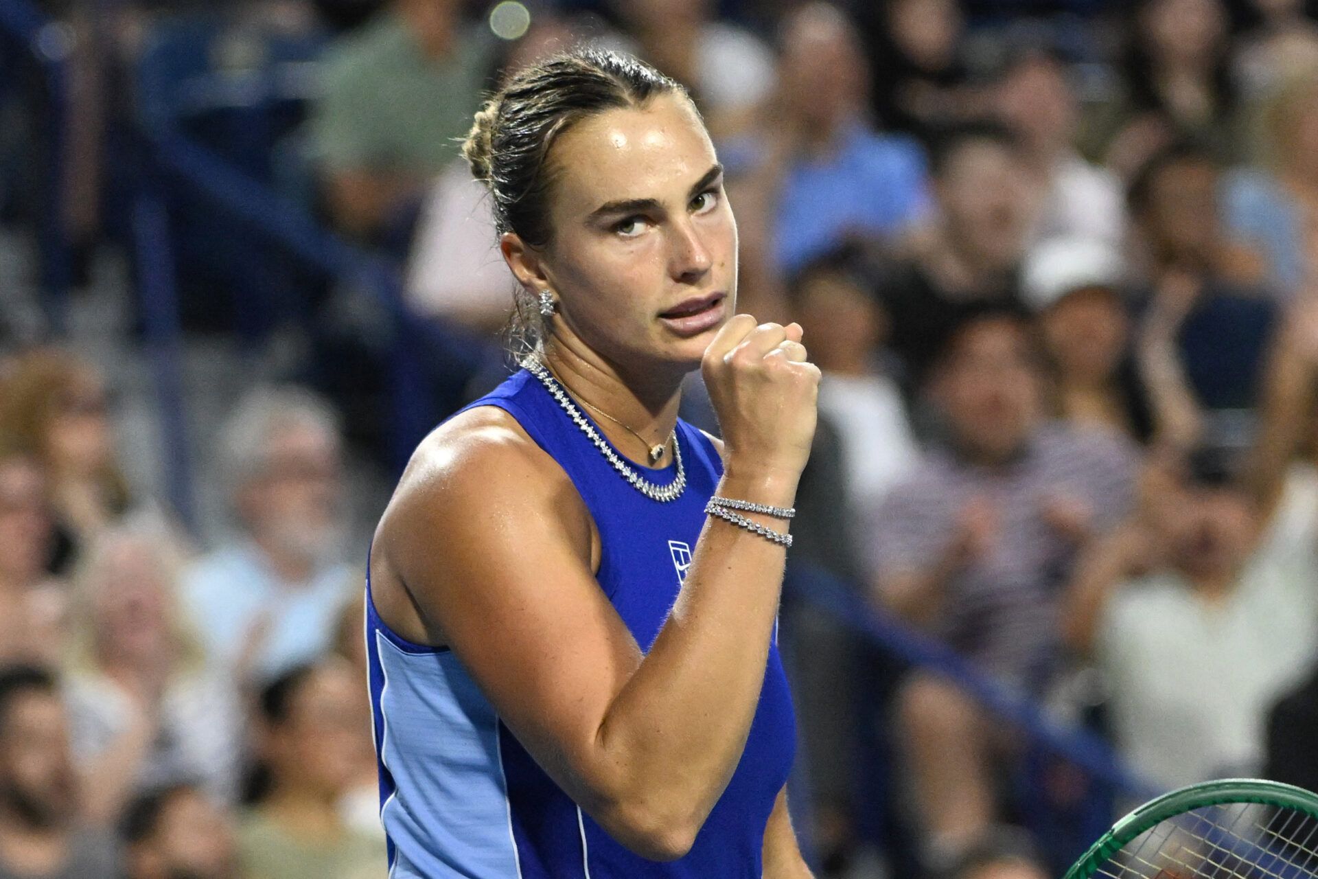 Aryna Sabalenka reacts after winning a point against Shuai Zhang (CHN) during third round play at Sobeys Stadium.