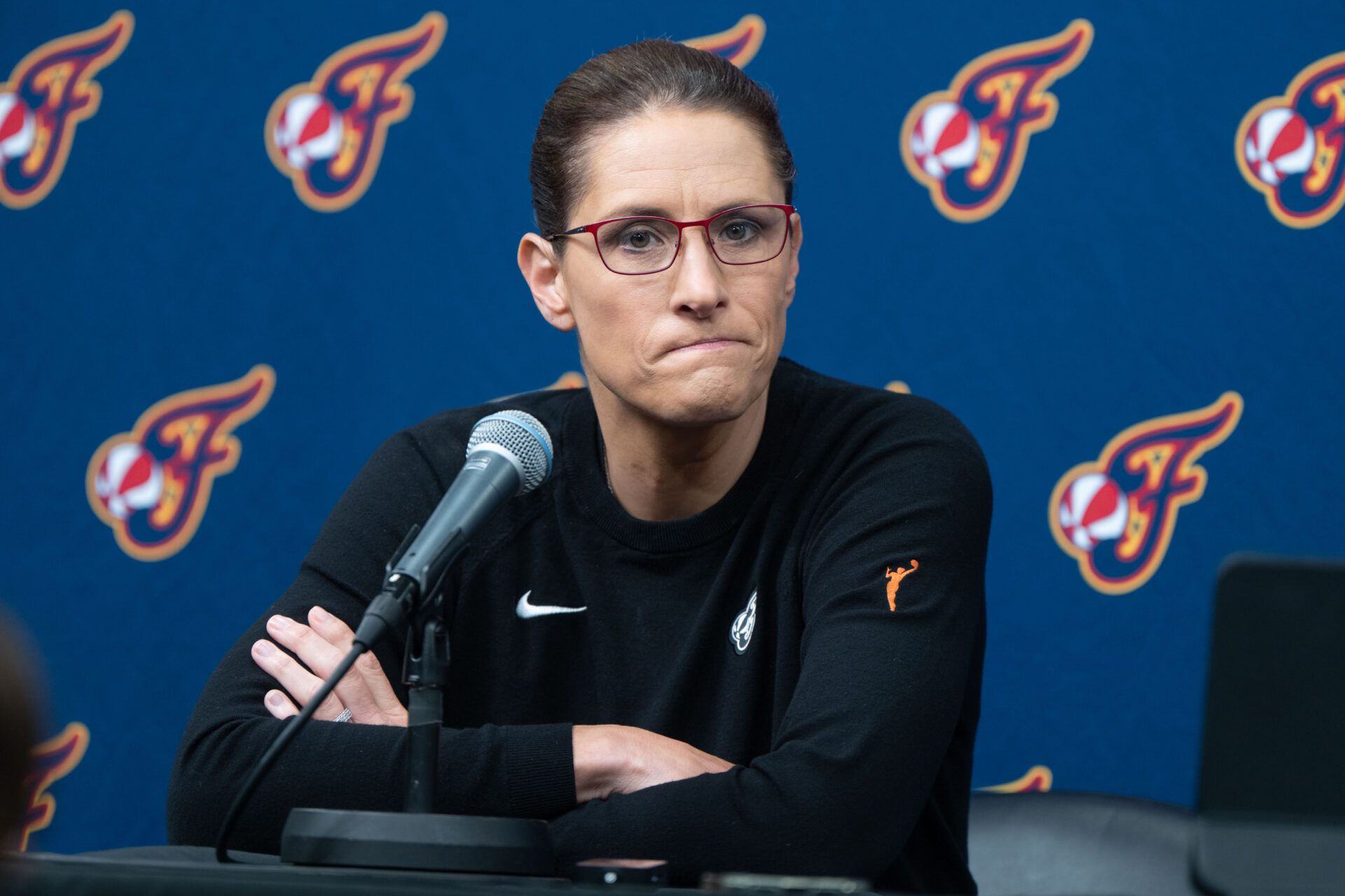Indiana Fever head coach Stephanie White talks with the media before the game between the Minnesota Lynx and Indiana Fever at Target Center.