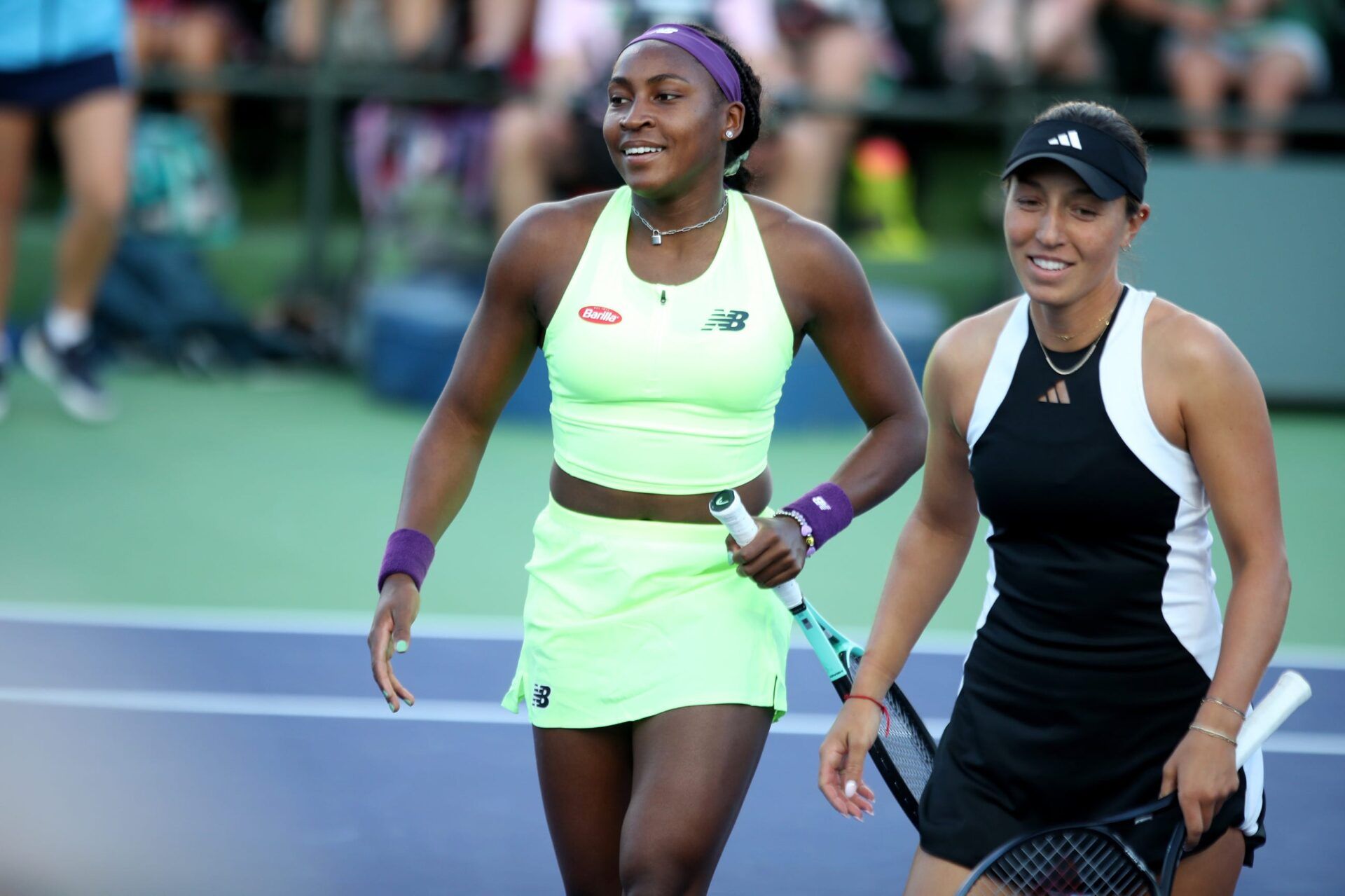 Coco Gauff and Jessica Pegula take on Desirae Krawczyk and Caroline Dolehide (not pictured) in their second-round doubles match on Stadium 3 at the BNP Paribas Open in Indian Wells, Calif., on Monday, March 11, 2024.