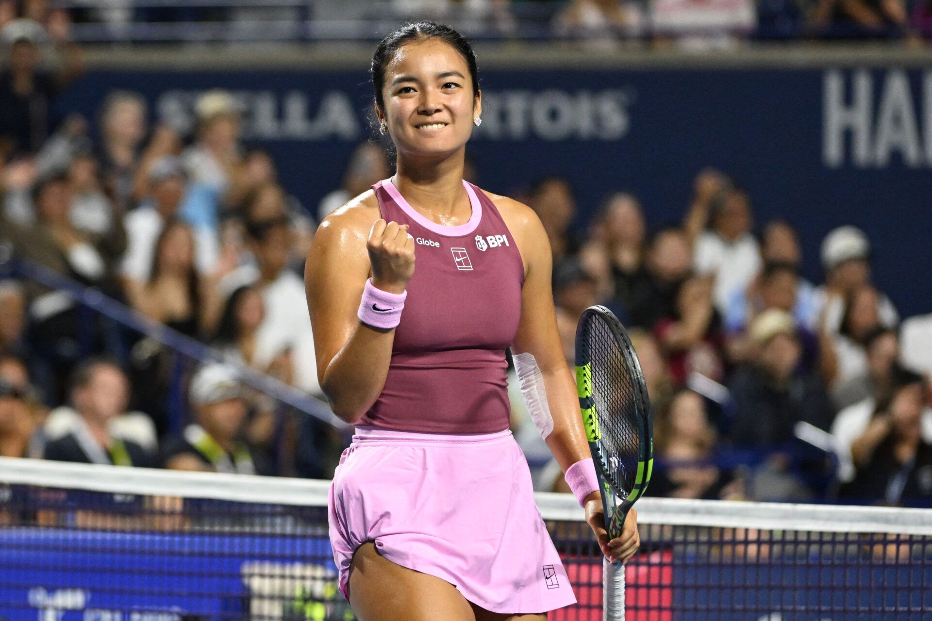 Alexandra Eala (PHI) reacts after winning a game against Caty McNally (USA) during third round play at Sobeys Stadium.