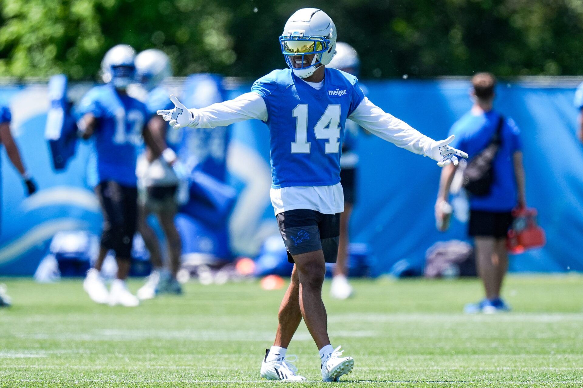Detroit Lions wide receiver Amon-Ra St. Brown (14) practices a drill during OTAs at Meijer Performance Center in Allen Park on Friday, May 29, 2026.