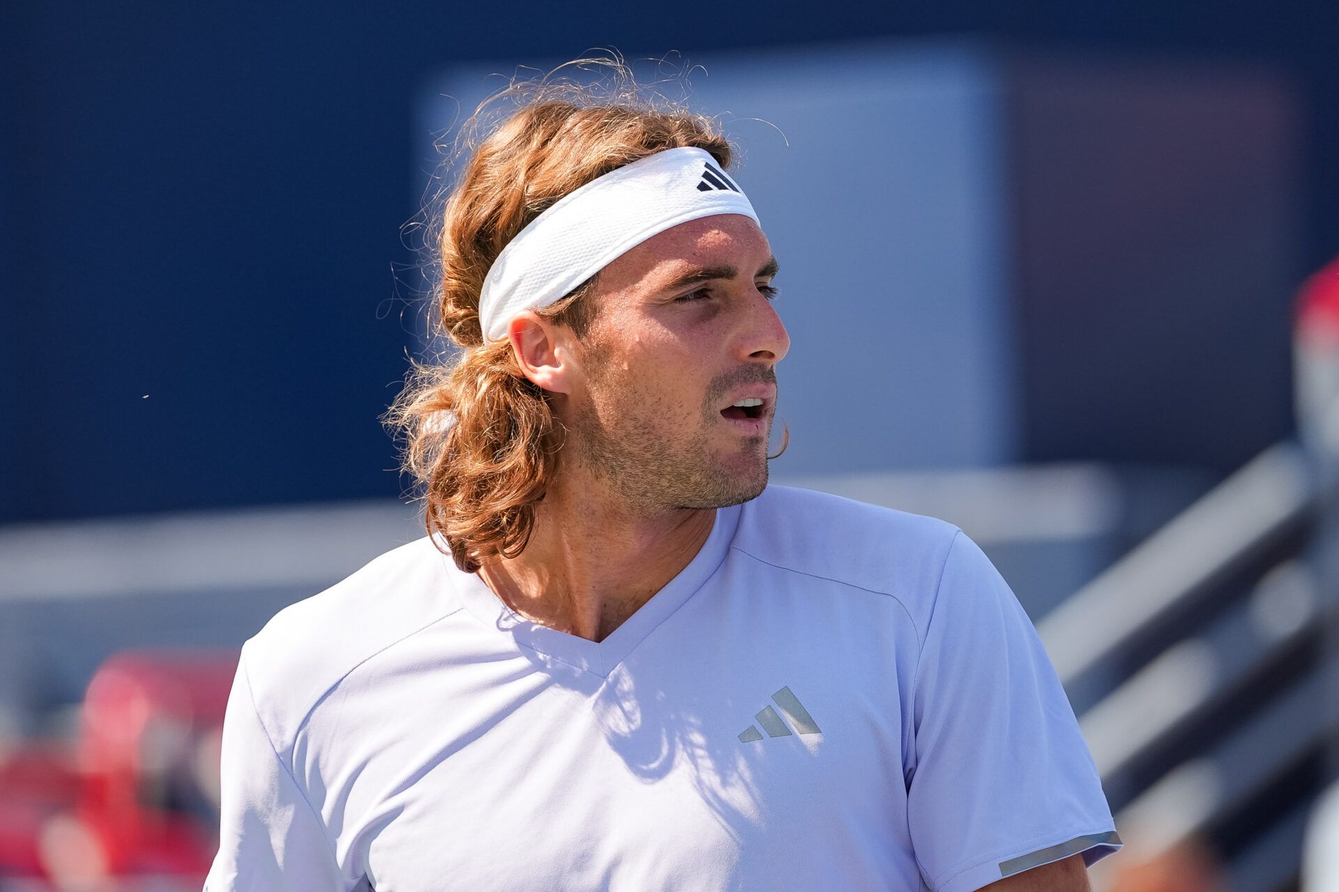 Stefanos Tsitsipas (GRE) looks on against Martin Damm (USA) in first round play at IGA Stadium.