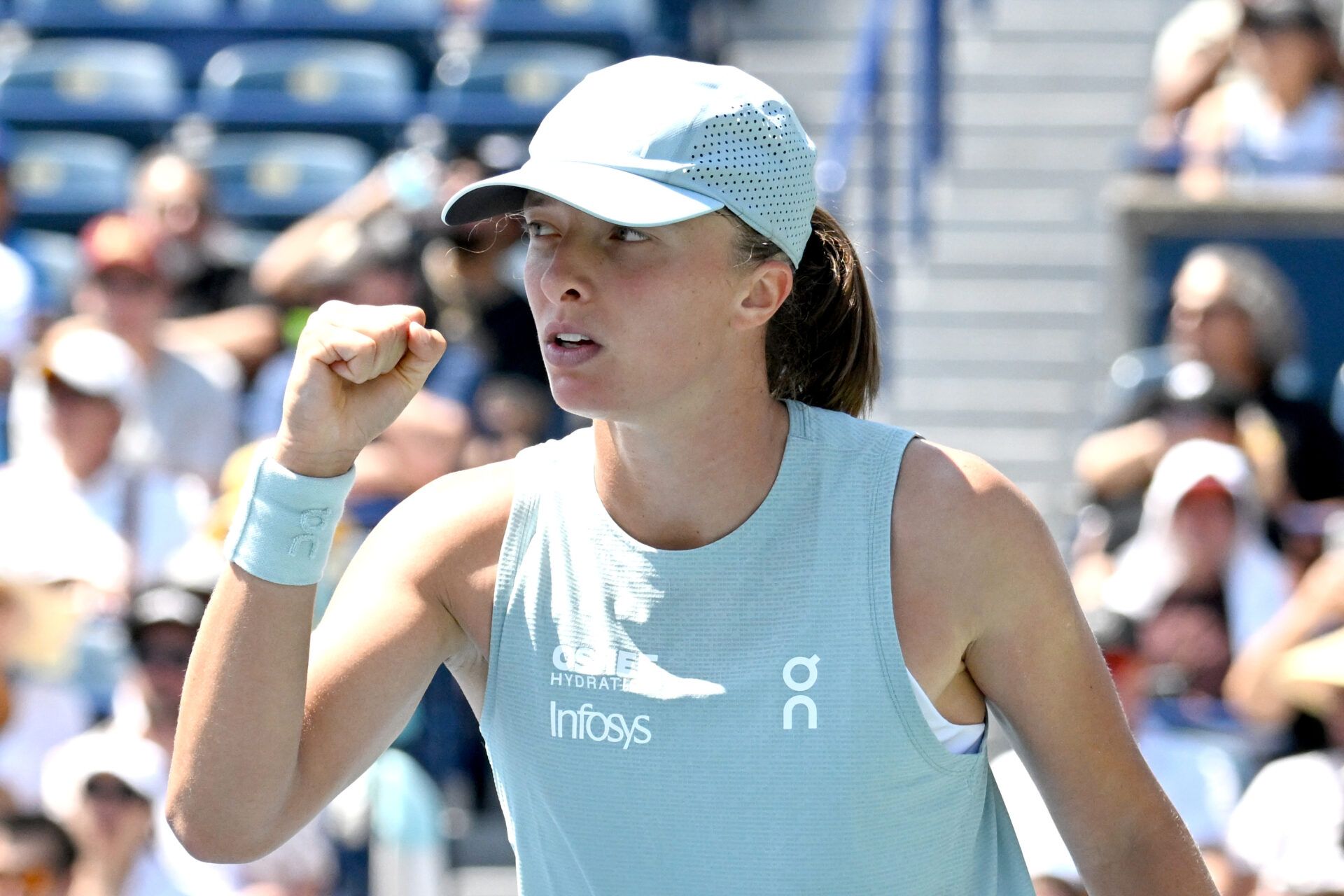 Iga Swiatek (POL) reacts after winning a point against Sara Bejlek (CZE) during second round play at Sobeys Stadium.