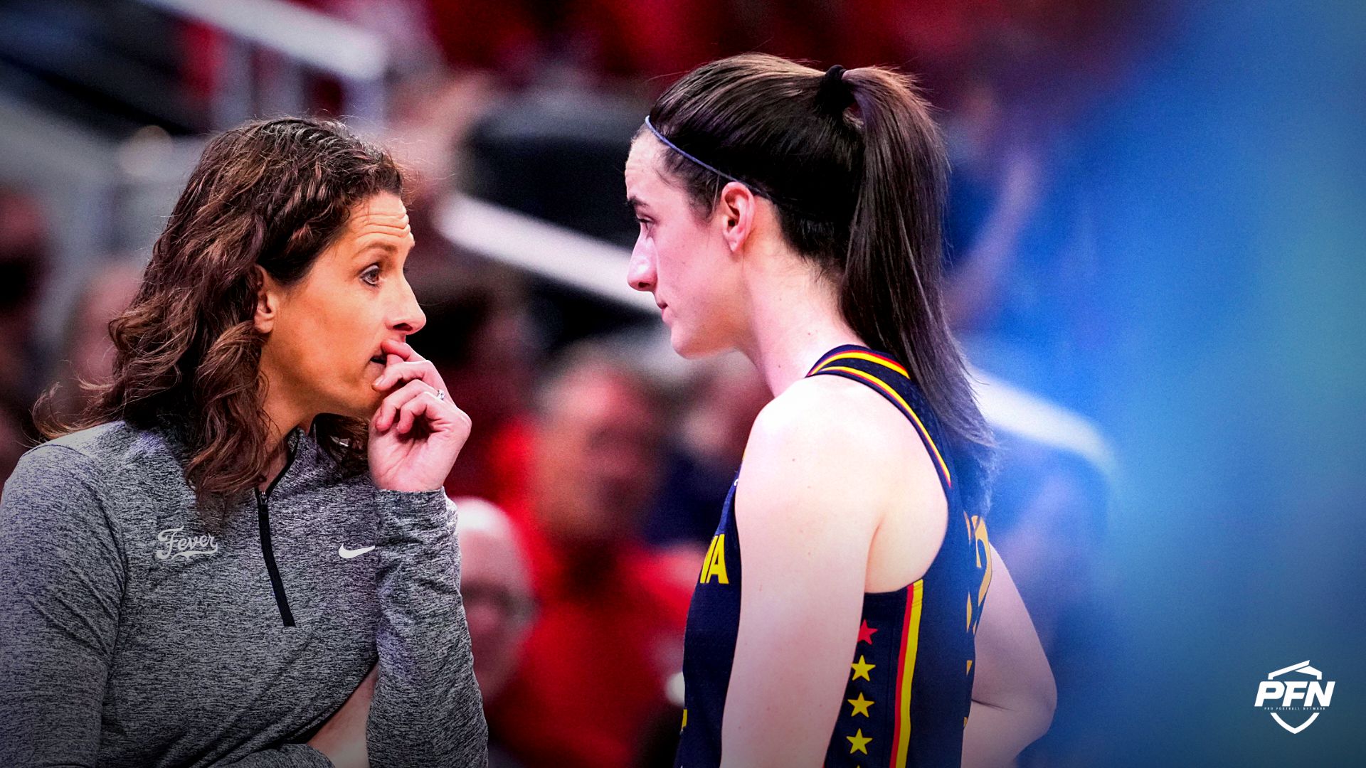 Indiana Fever head coach Stephanie White talks with Indiana Fever guard Caitlin Clark (22) on Thursday, June 11, 2026, during the second half of a game at Gainbridge Fieldhouse in Indianapolis. The Indiana Fever defeated the Chicago Sky, 114-106.