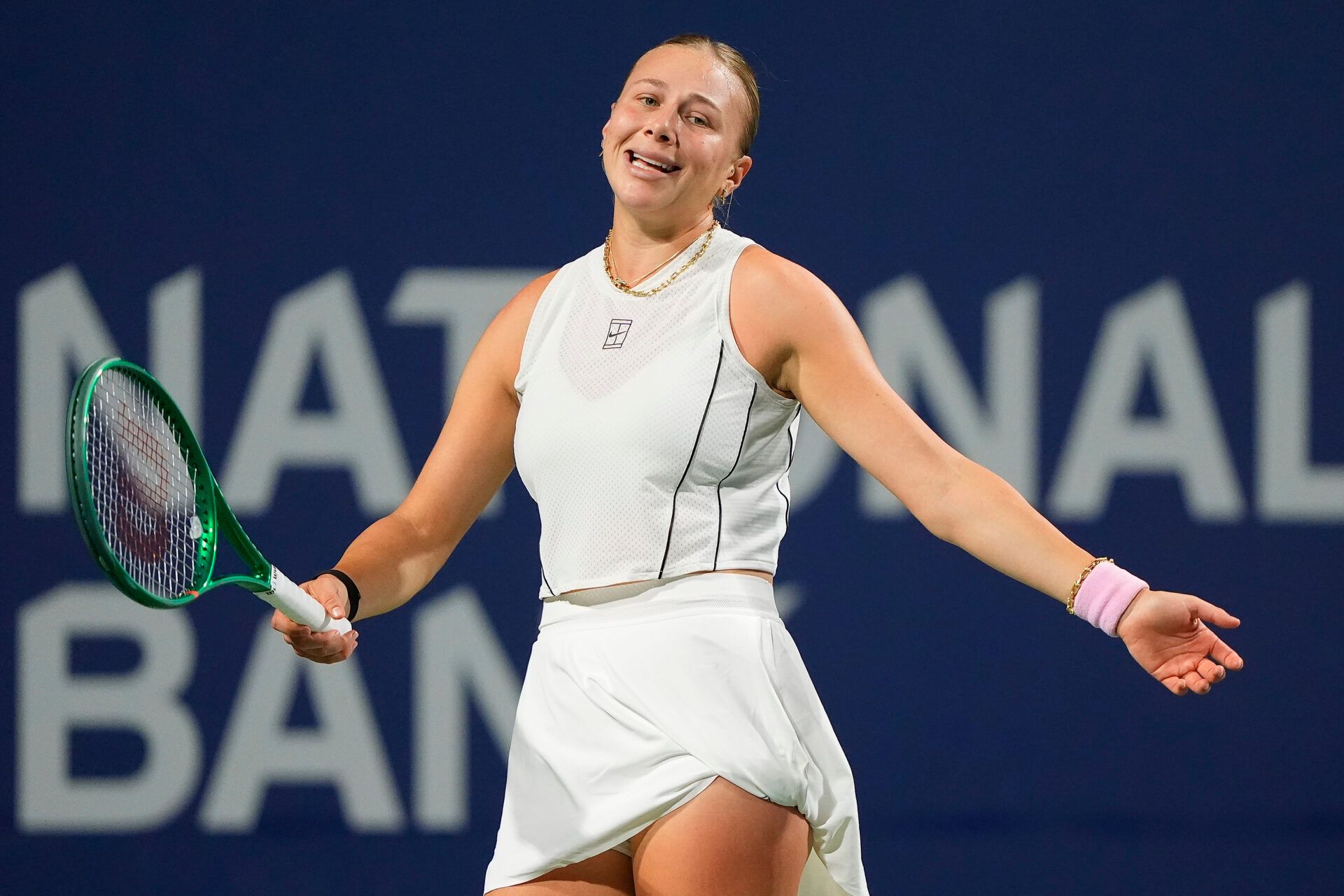 Amanda Anisimova (USA) reacts after missing a point against  Elina Svitolina (not pictured) during the fourth round at the National Bank Open at Sobeys Stadium.