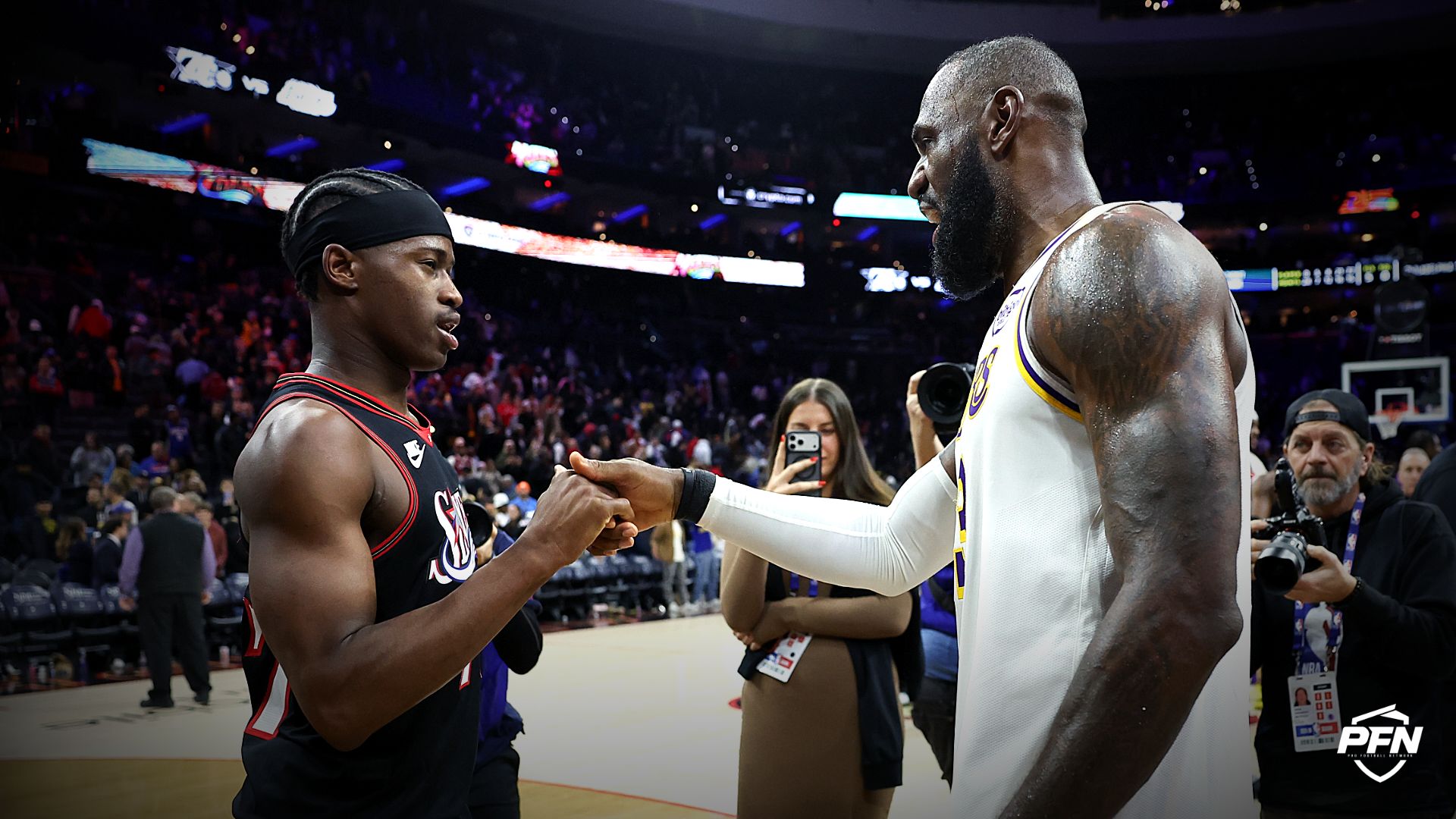 Los Angeles Lakers forward Lebron James (23) shakes hands with Philadelphia 76ers guard Vj Edgecombe (77) after the game at Xfinity Mobile Arena.