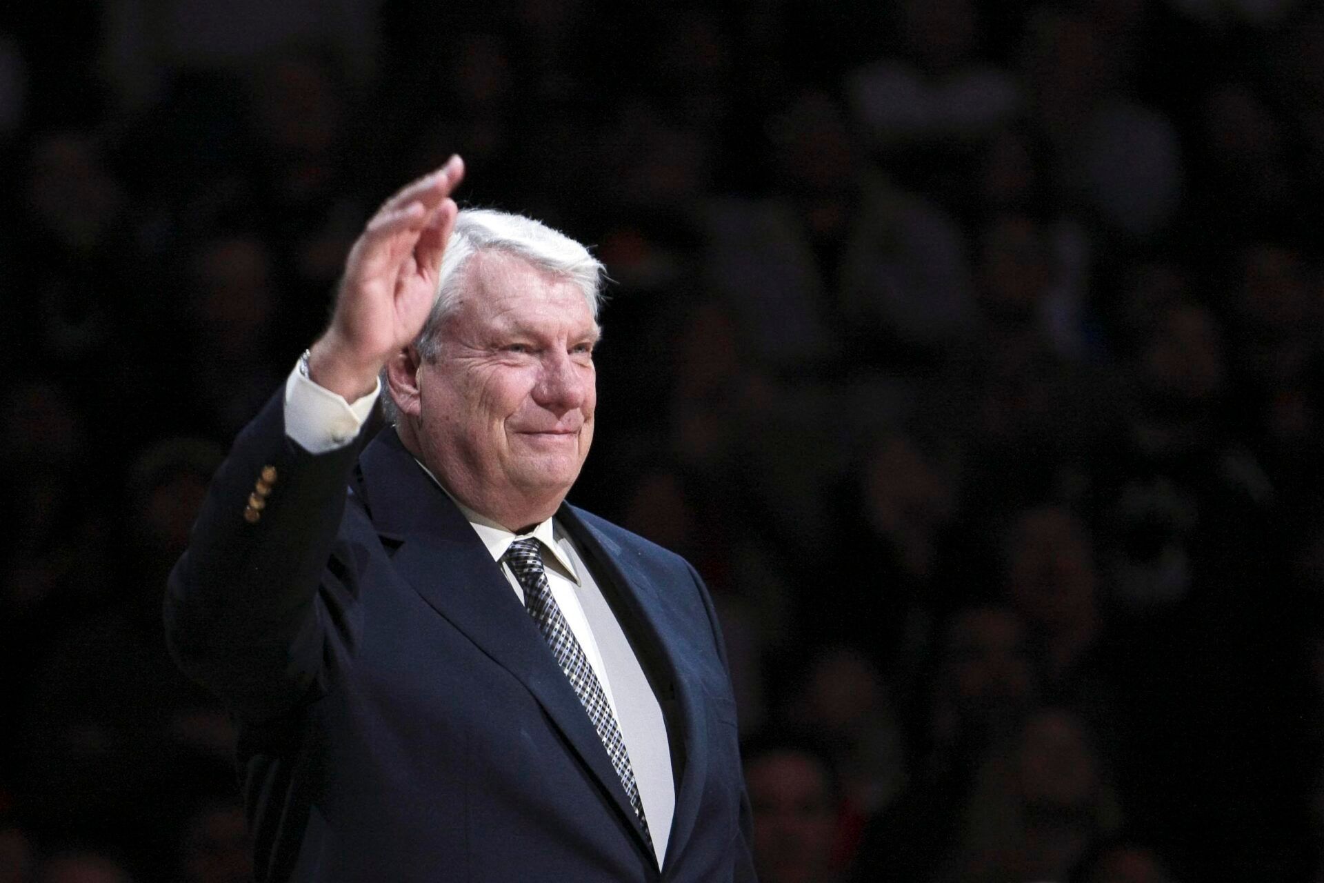 Golden State Warriors former coach Don Nelson waves to fans during the half time ceremony to retire the #17 jersey of Chris Mullin at Oracle Arena.