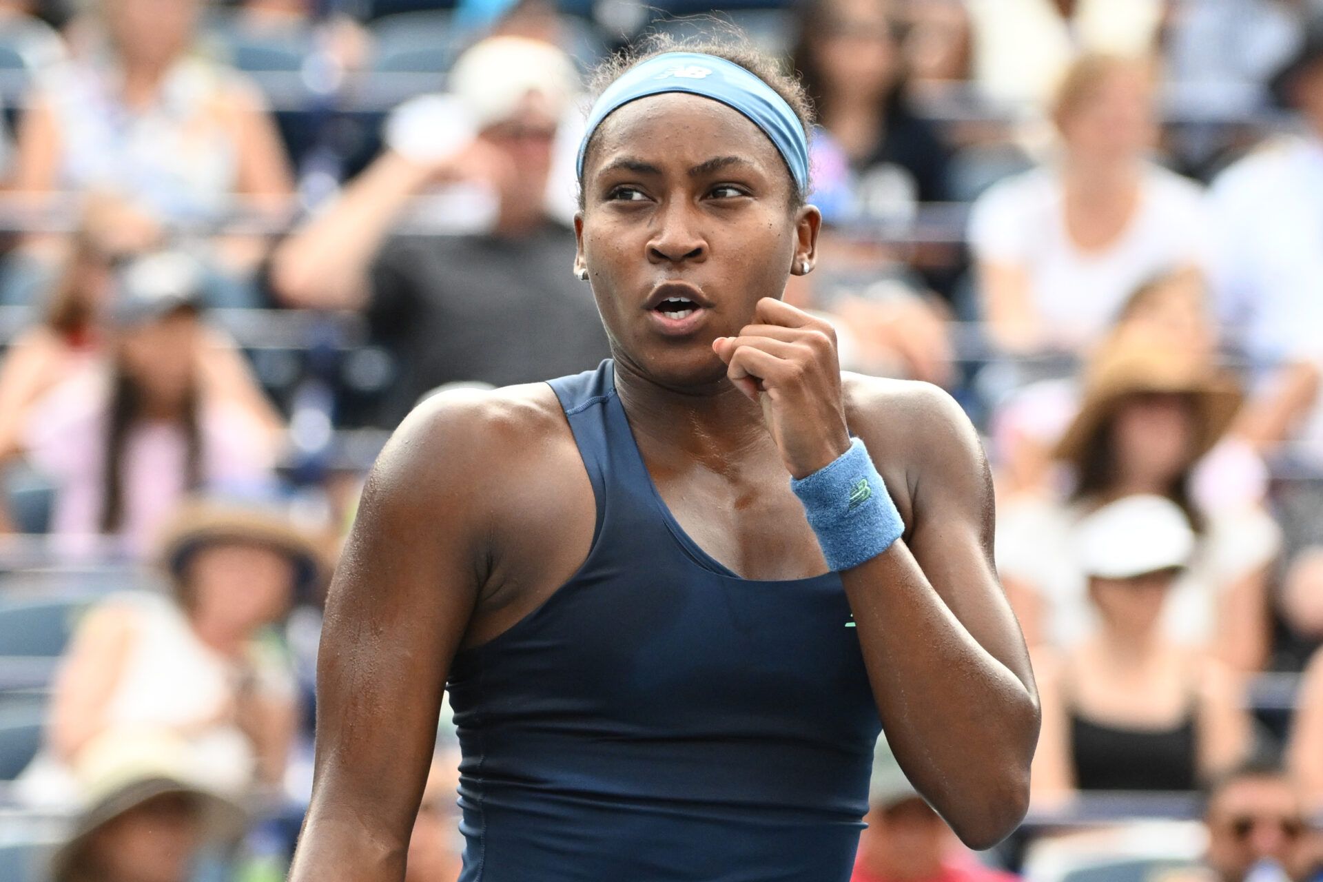 Coco Gauff (USA) reacts after winning the first set against Alina Korneeva during fourth round play at Sobeys Stadium.