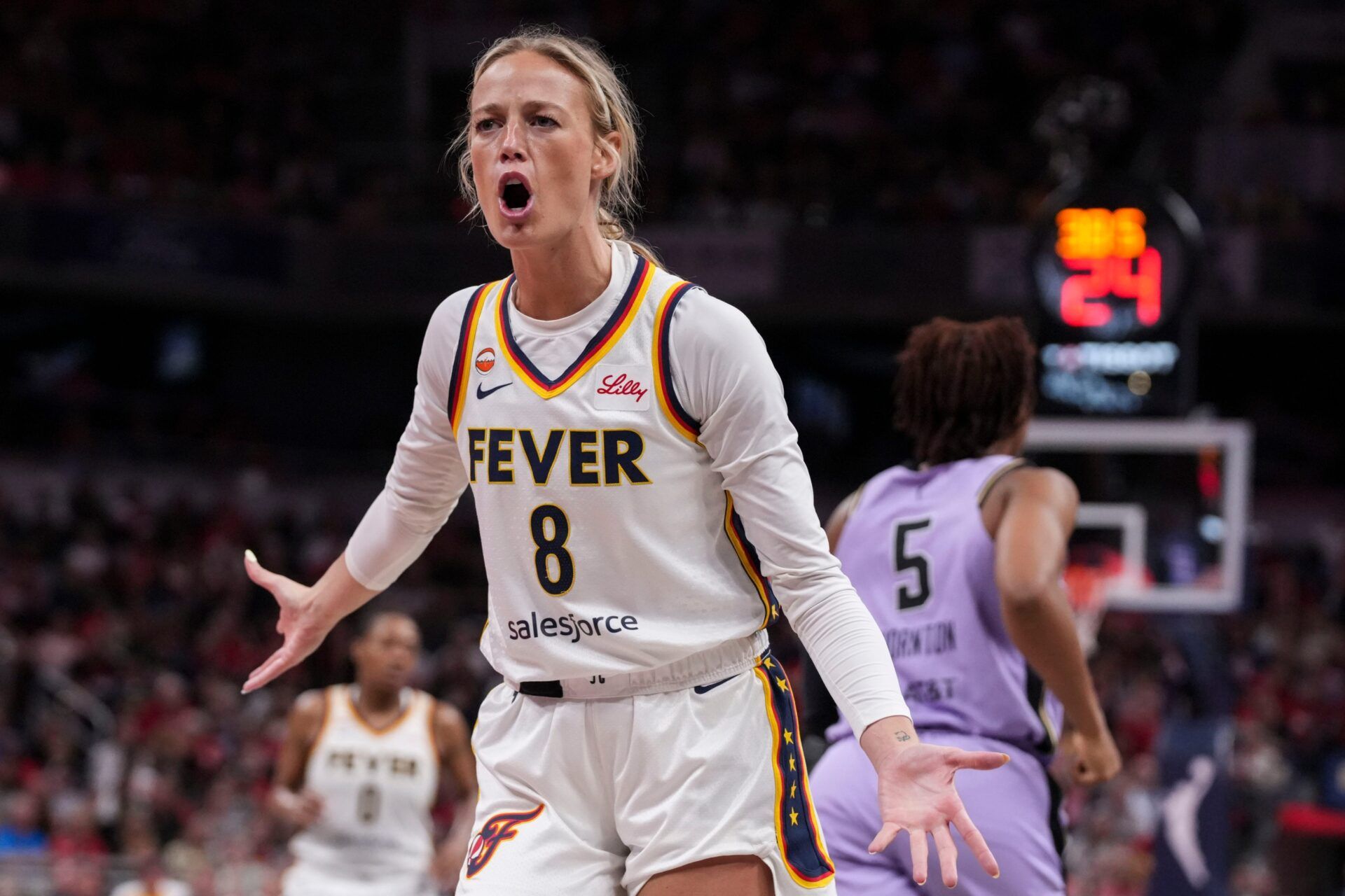 Indiana Fever guard Sophie Cunningham (8) reacts to the action Wednesday, July 15, 2026, during the second half of a game at Gainbridge Fieldhouse in Indianapolis. The Golden State Valkyries defeated the Indiana Fever, 88-75.