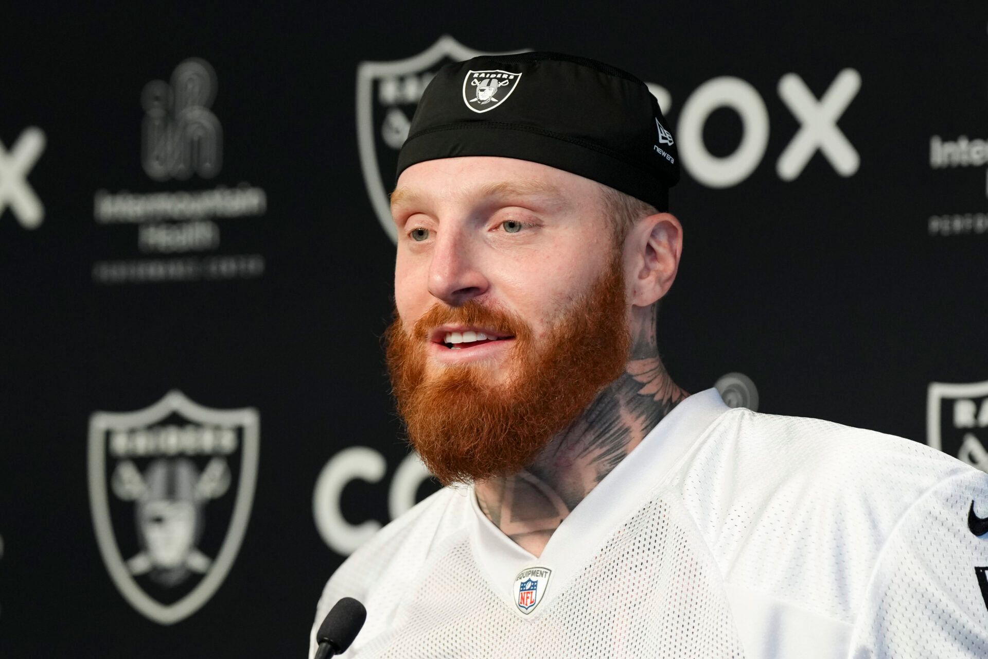 Las Vegas Raiders defensive end Maxx Crosby (98) speaks during a news conference during organized team activities at Intermountain Health Performance Center.