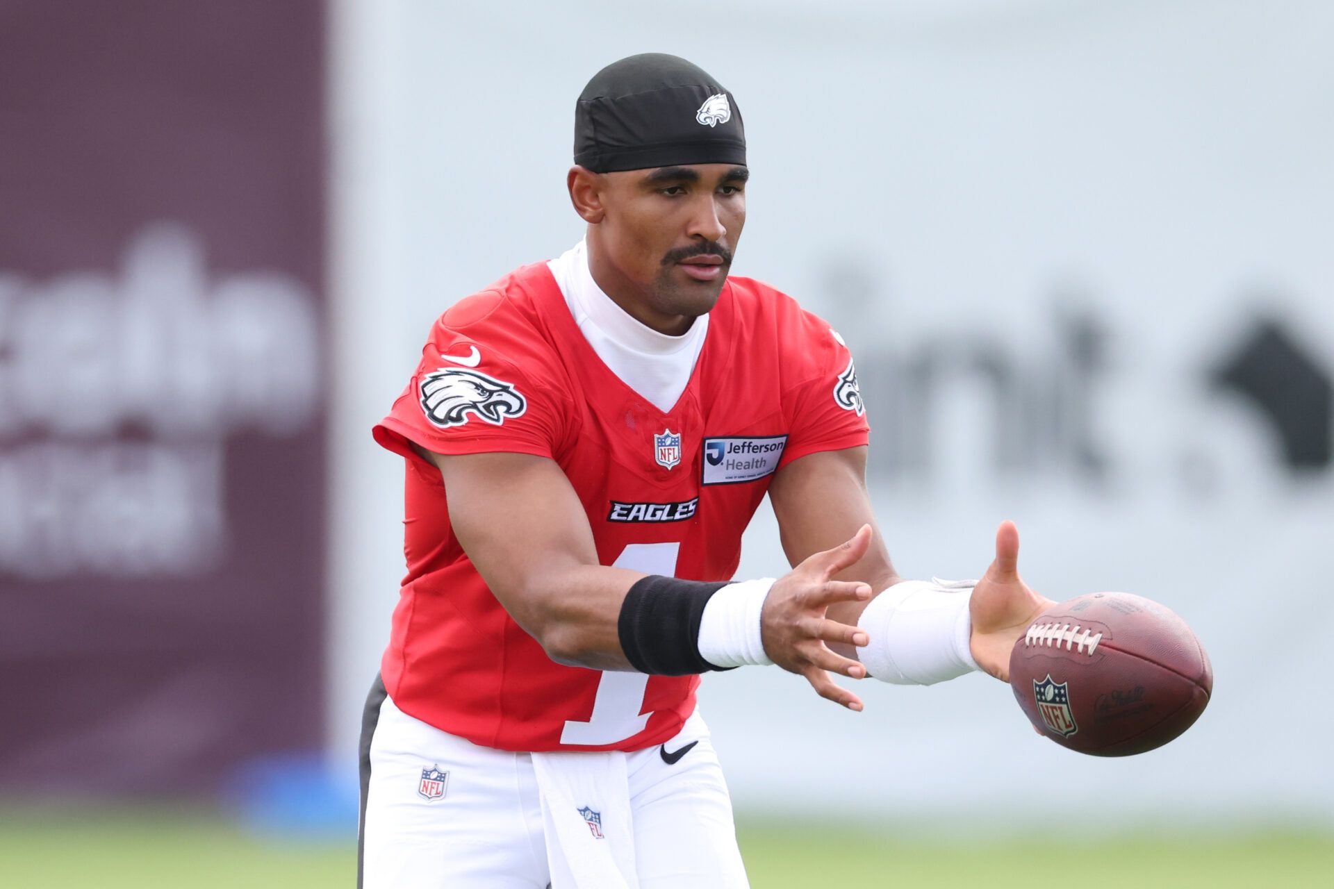 Philadelphia Eagles quarterback Jalen Hurts (1) runs a drill during training camp at Jefferson Health Training Complex.