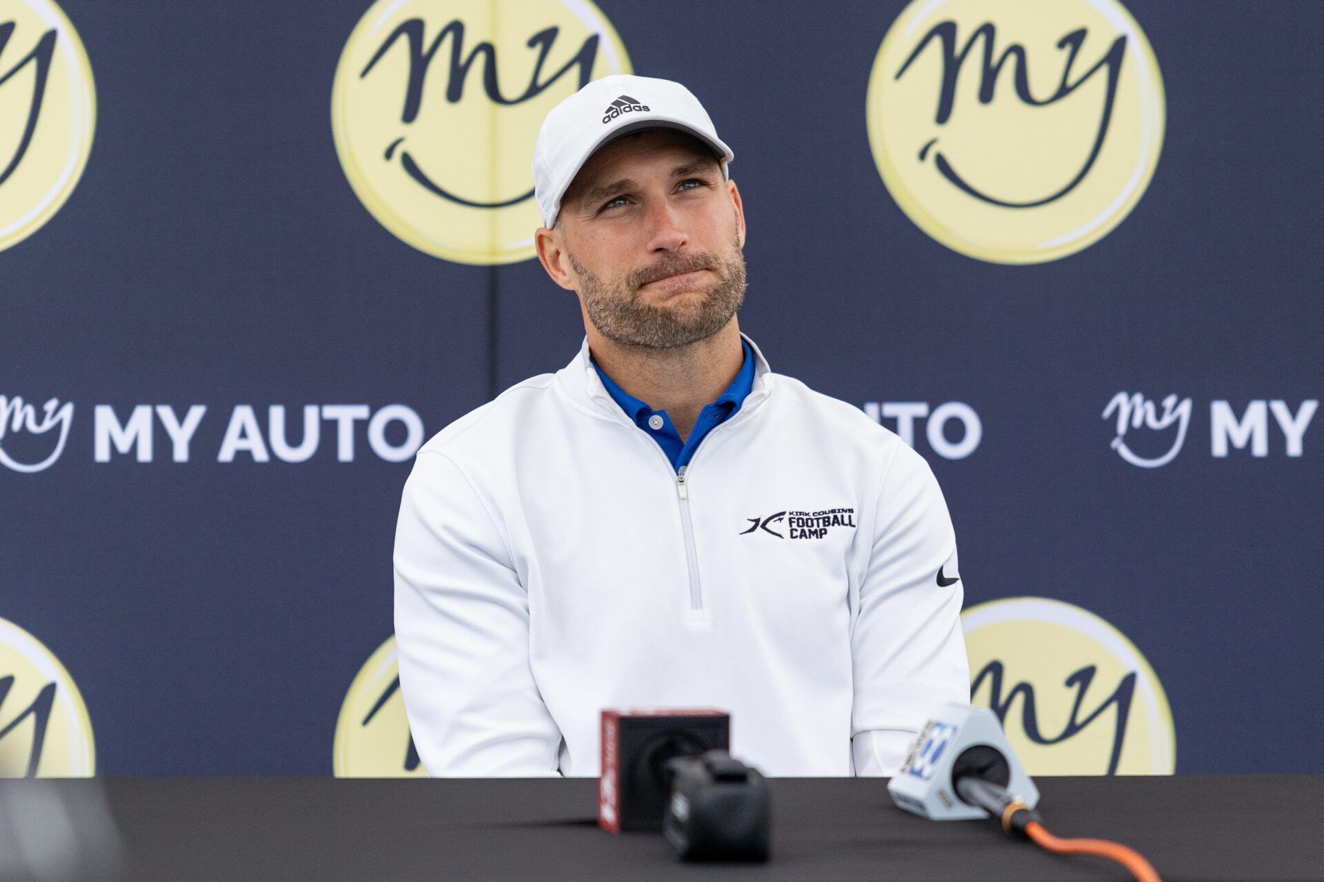Kirk Cousins answers questions from the media during the Kirk Cousins Football Camp on Wednesday, June 24.