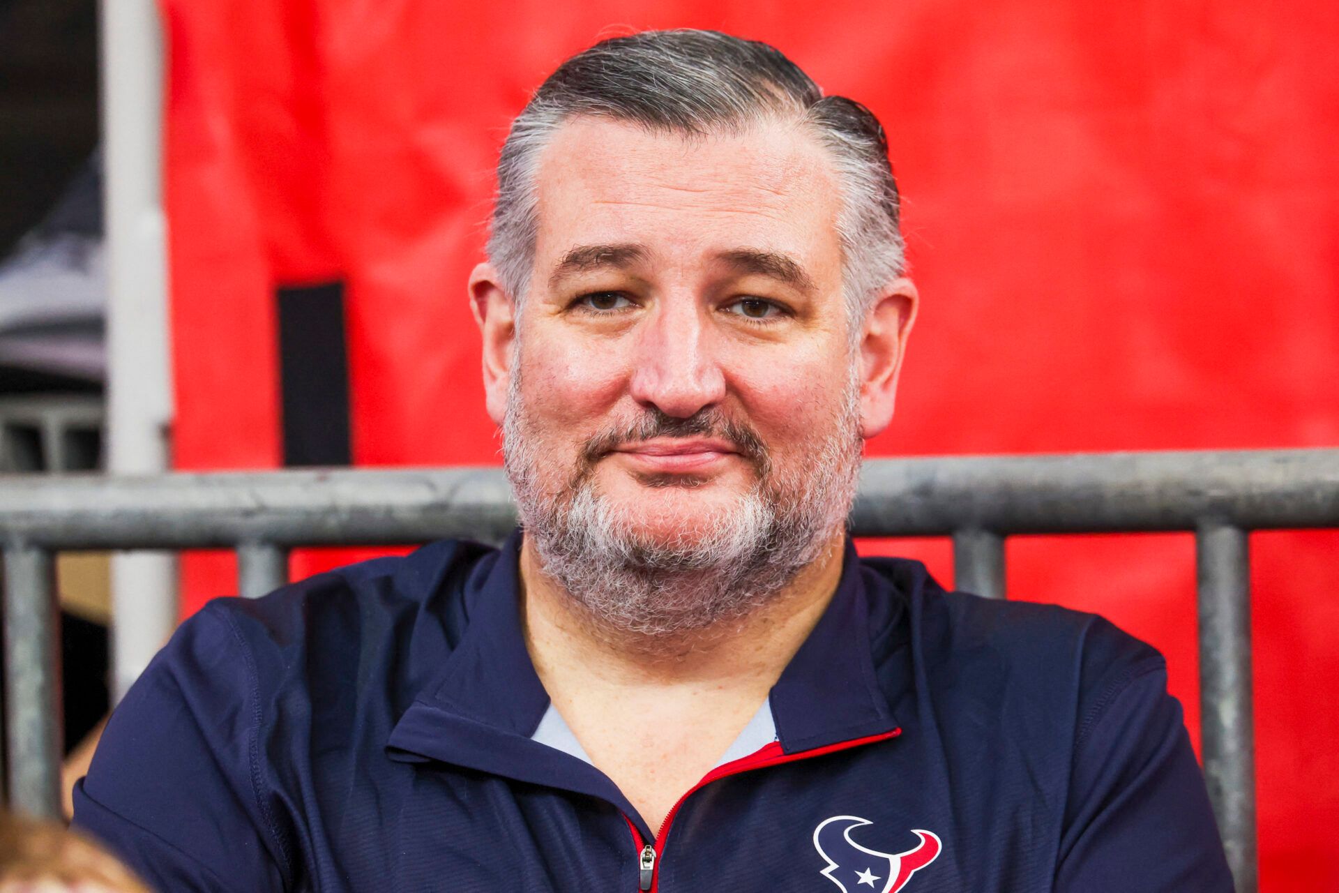 Sen. Ted Cruz, Republican, sits on the field during the first half of a game between the Las Vegas Raiders and Houston Texans at NRG Stadium.