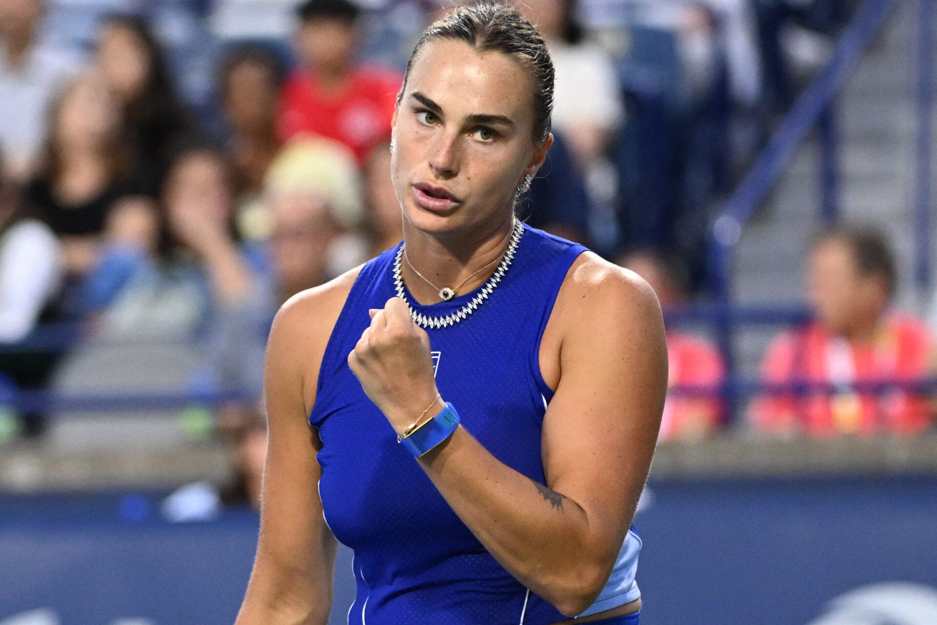 Aryna Sabalenka reacts after winning a point against Moyuka Uchijima (JPN) during second round play at Sobeys Stadium.