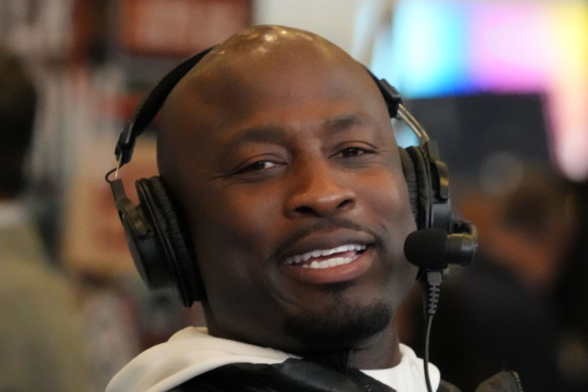 Akbar Gbaja-Biamila on the You Better You Bet show on the Westwood One radio set at the Super Bowl LX media center at the Moscone Center.