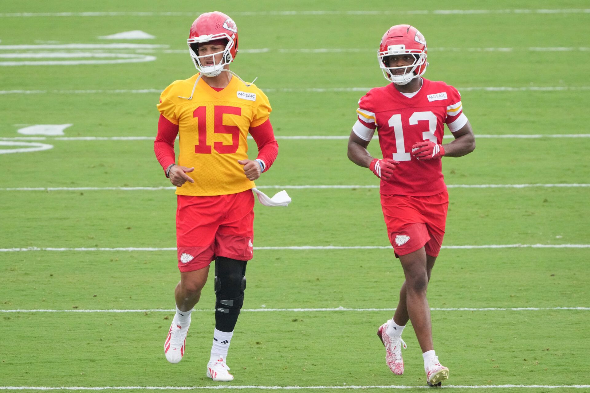 Kansas City Chiefs   quarterback Patrick Mahomes (15) and safety Cyrus Allen (13) on field during training camp at Missouri Western State University.