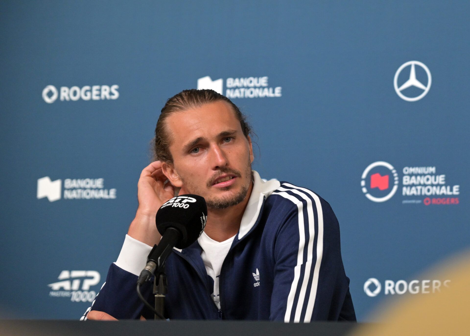 Alexander Zverev (GER) gives a presser during first round play at IGA Stadium.