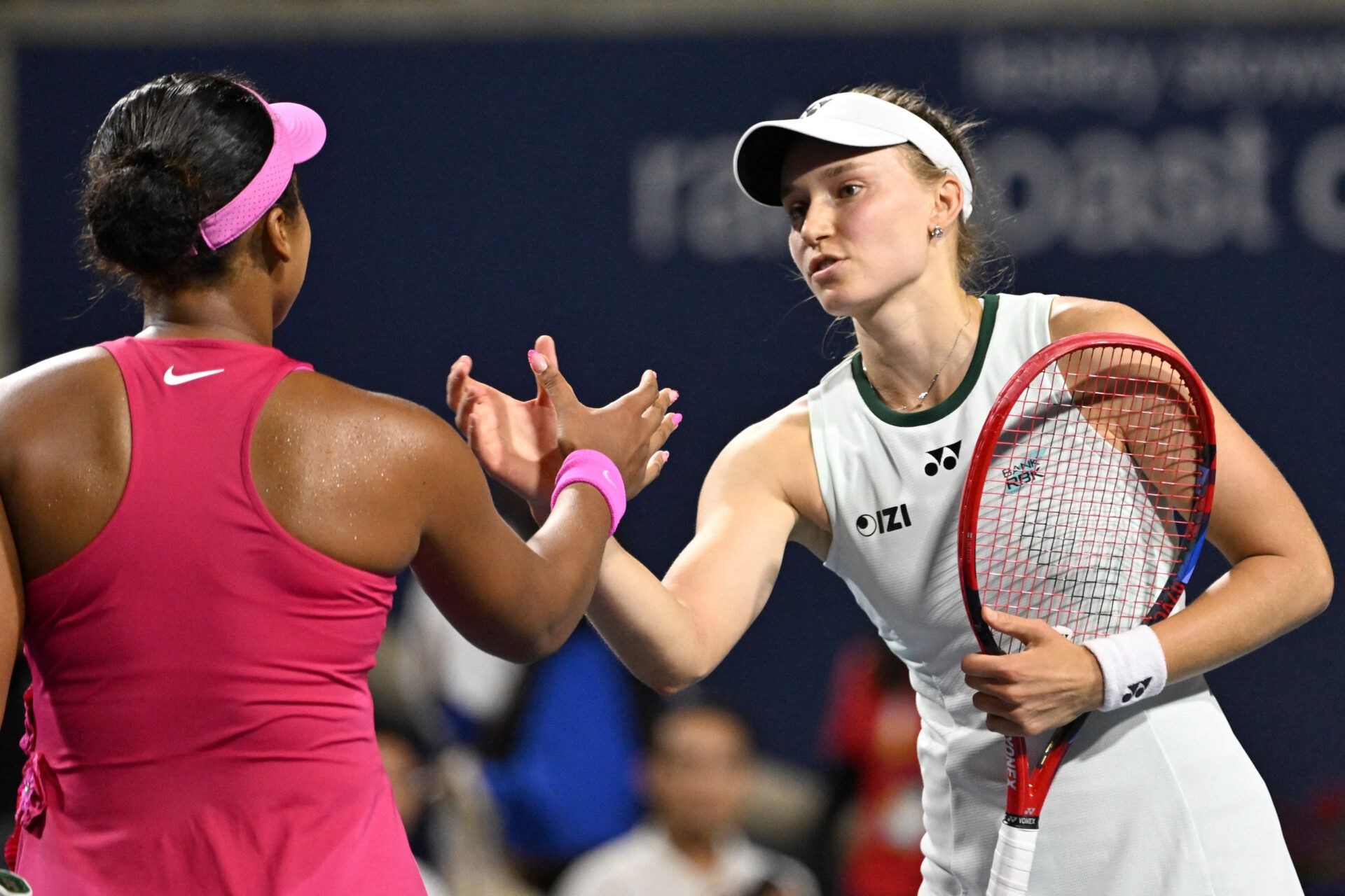 Elena Rybakina (KAZ) shakes hands after defeating Naomi Osaka (JPN) during quarter final play at Sobeys Stadium.