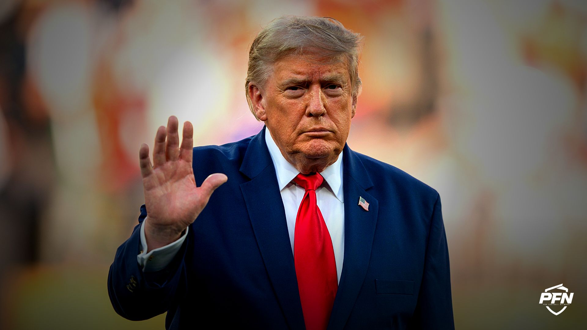 President Donald Trump waves to the crowd.