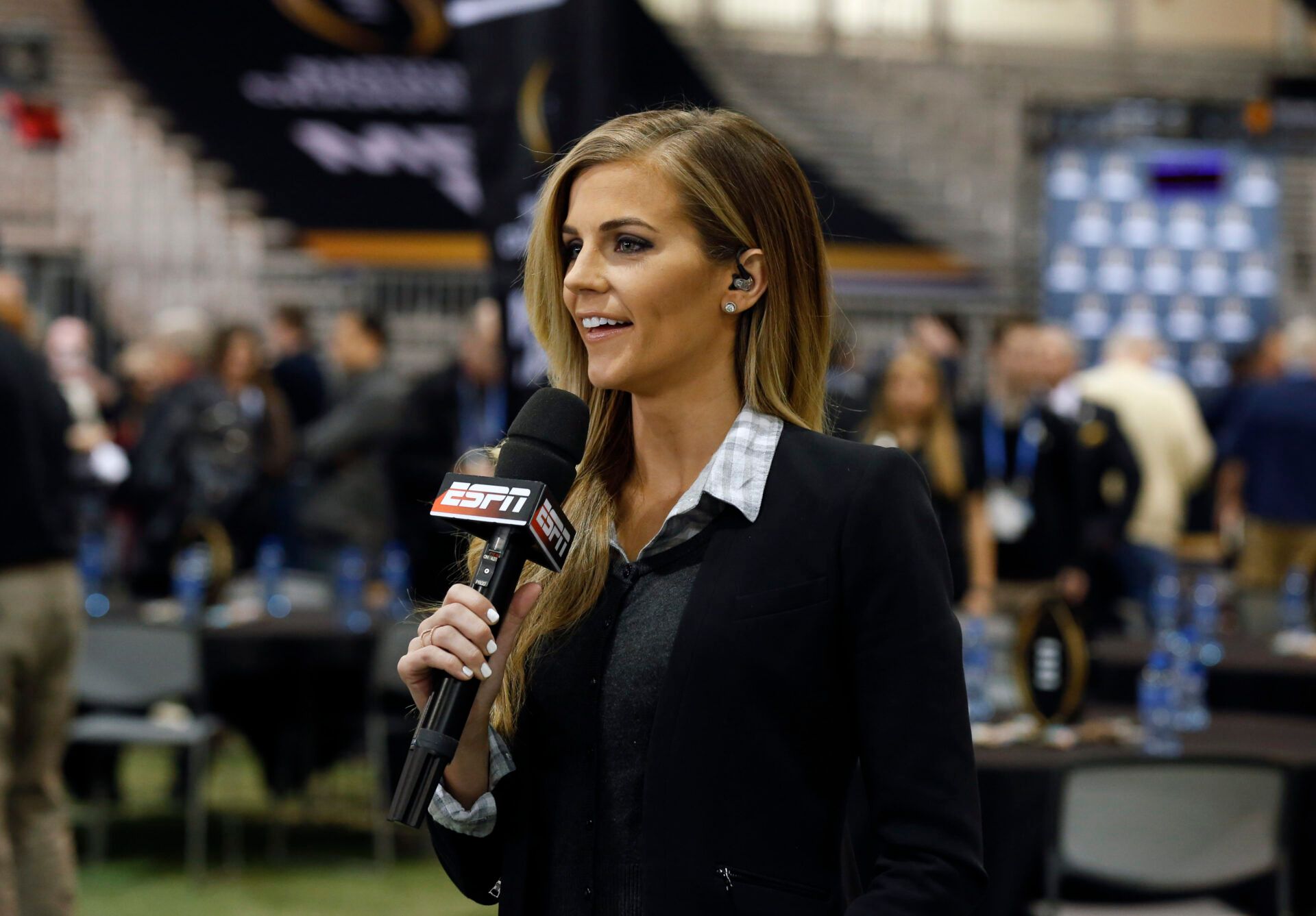 ESPN reporter Samantha Ponder commentates at media day at Phoenix Convention Center.