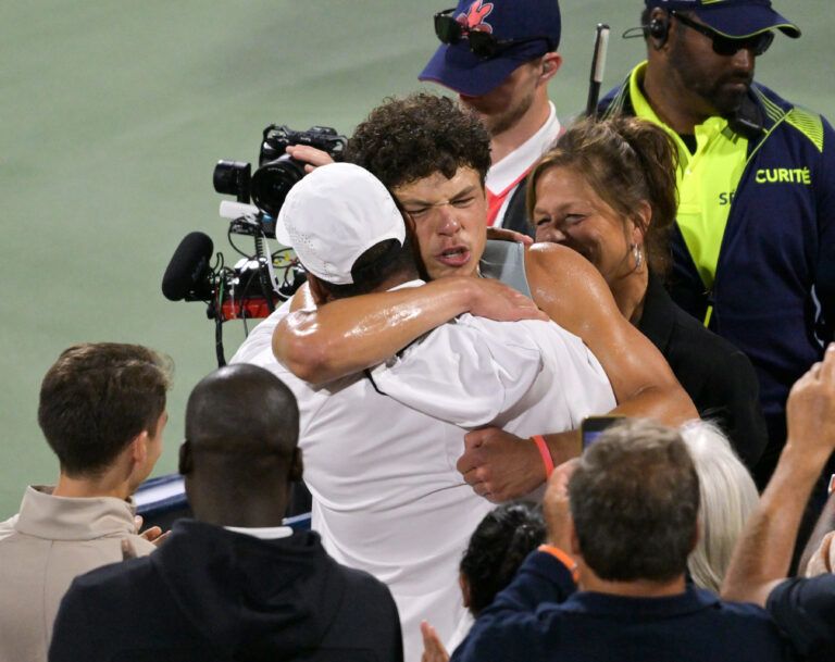 Ben Shelton (USA) hugs his father Bryan Shelton after winning the singles final against Brandon Nakashima (USA) at IGA Stadium.