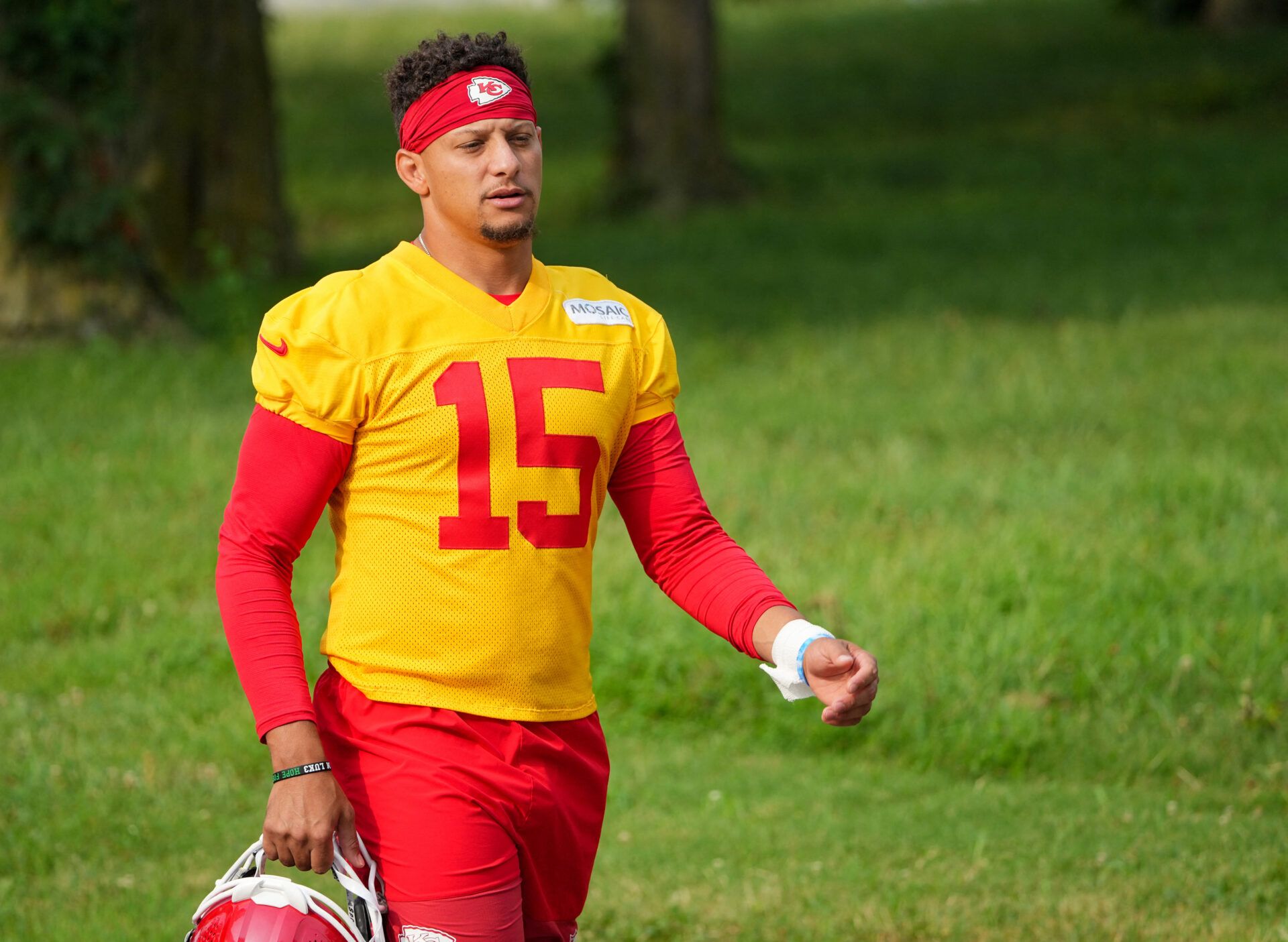 Kansas City Chiefs quarterback Patrick Mahomes (15) walks down the hill to the fields prior to training camp at Missouri Western State University.