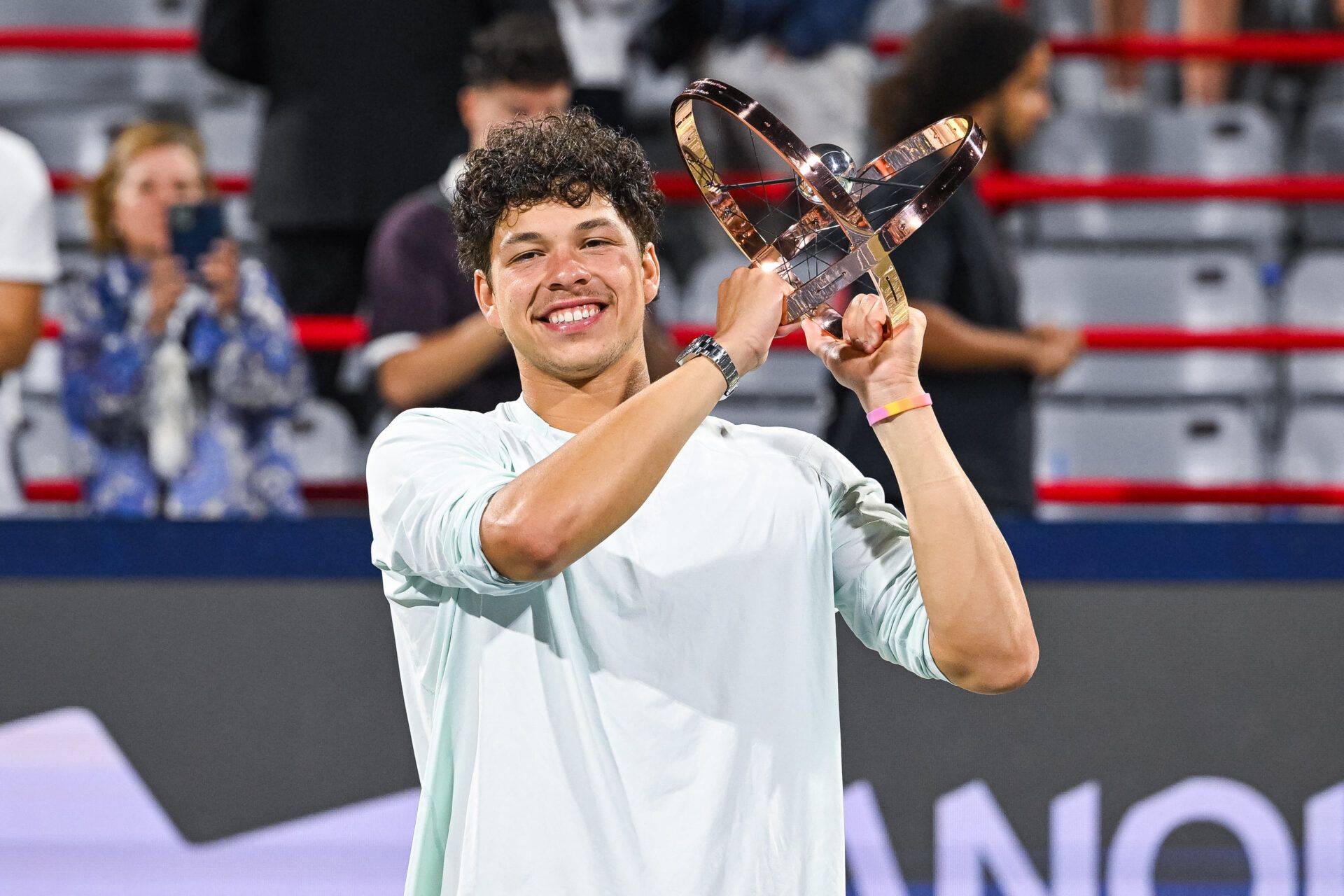 Ben Shelton (USA) winner of the singles final holds his trophy at IGA Stadium.