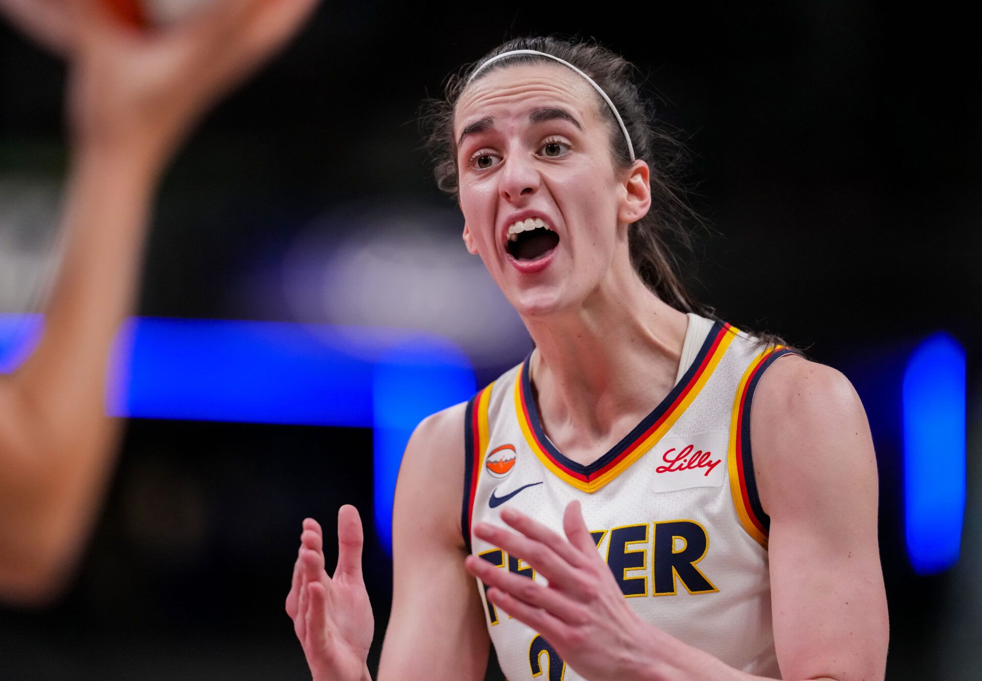 Indiana Fever guard Caitlin Clark (22) yells in frustration at the referee on Tuesday, Aug. 11, 2026, during the game at Gainbridge Fieldhouse in Indianapolis.