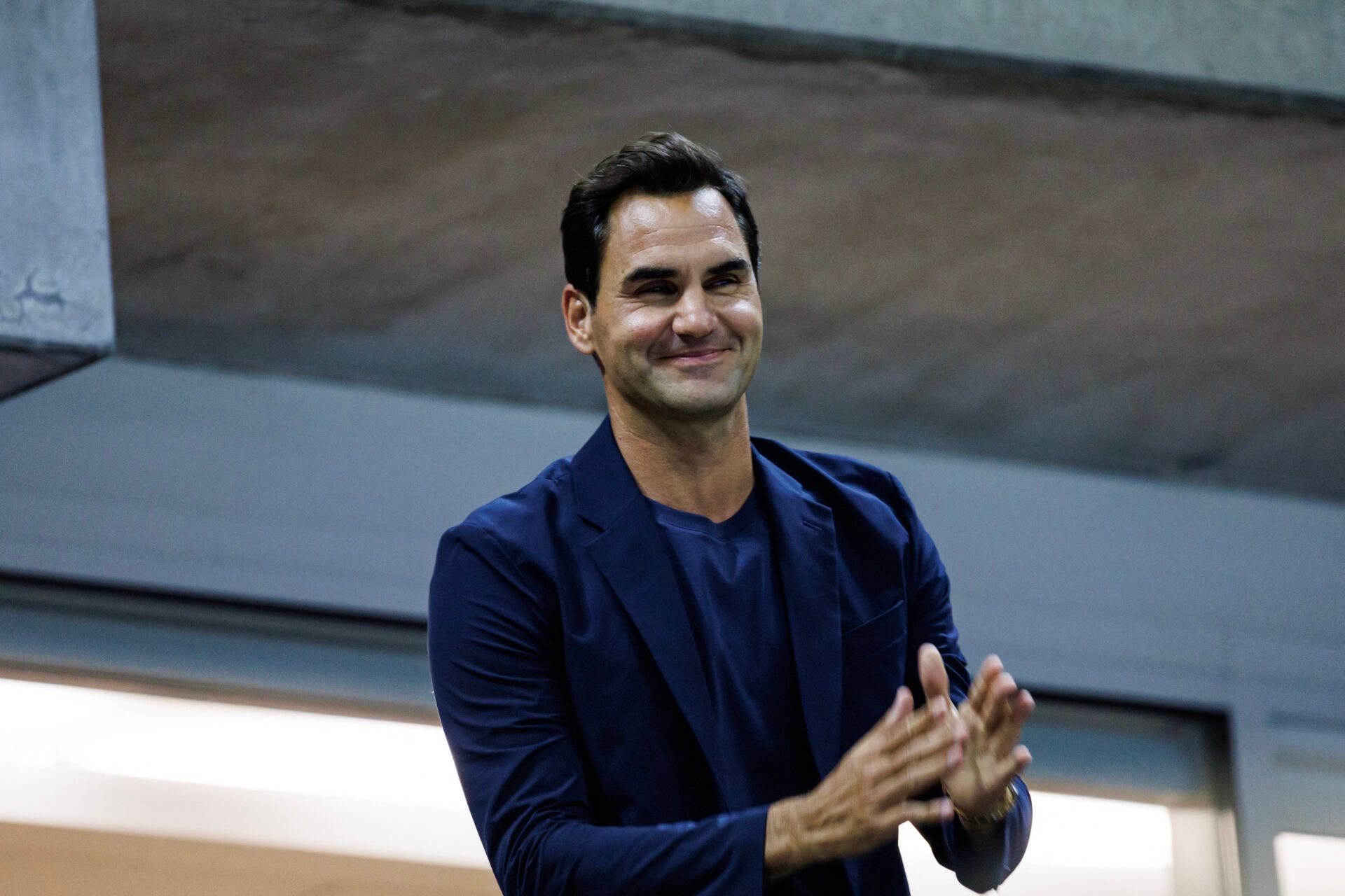 Roger Federer watches Aryna Sabalenka of Russia playing Qinwen Zheng of China on day nine of the U.S. Open tennis tournament at the USTA Billie Jean King National Tennis Center.