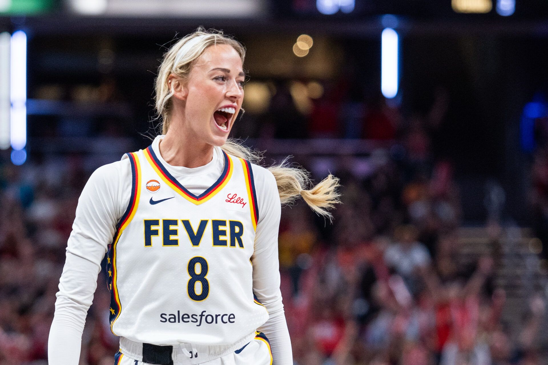 Indiana Fever guard Sophie Cunningham (8) celebrates a made shot in the second half against the New York Liberty at Gainbridge Fieldhouse.