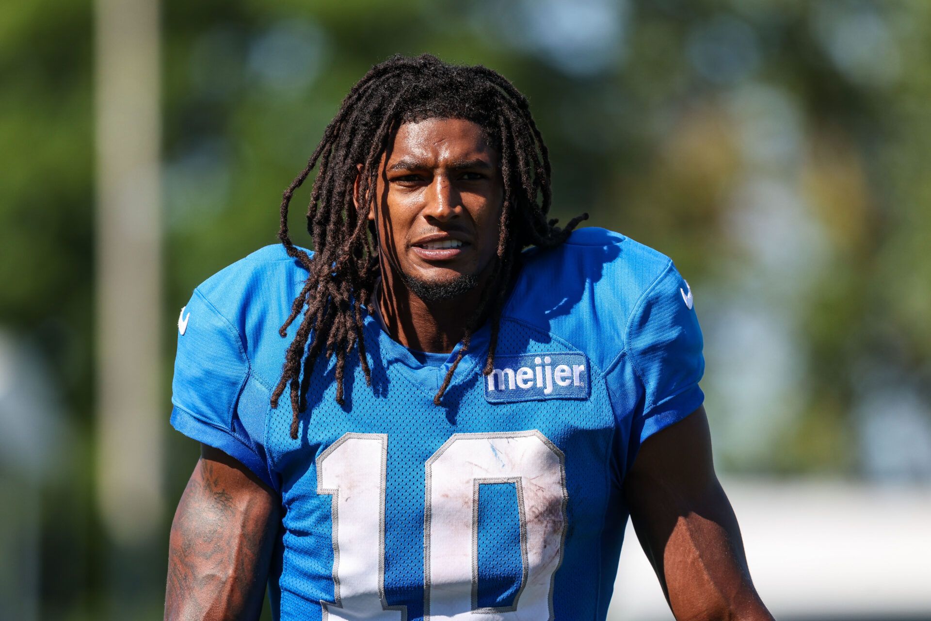 Detroit Lions running back Isiah Pacheco (10) walks off the field following Detroit Lions training camp.