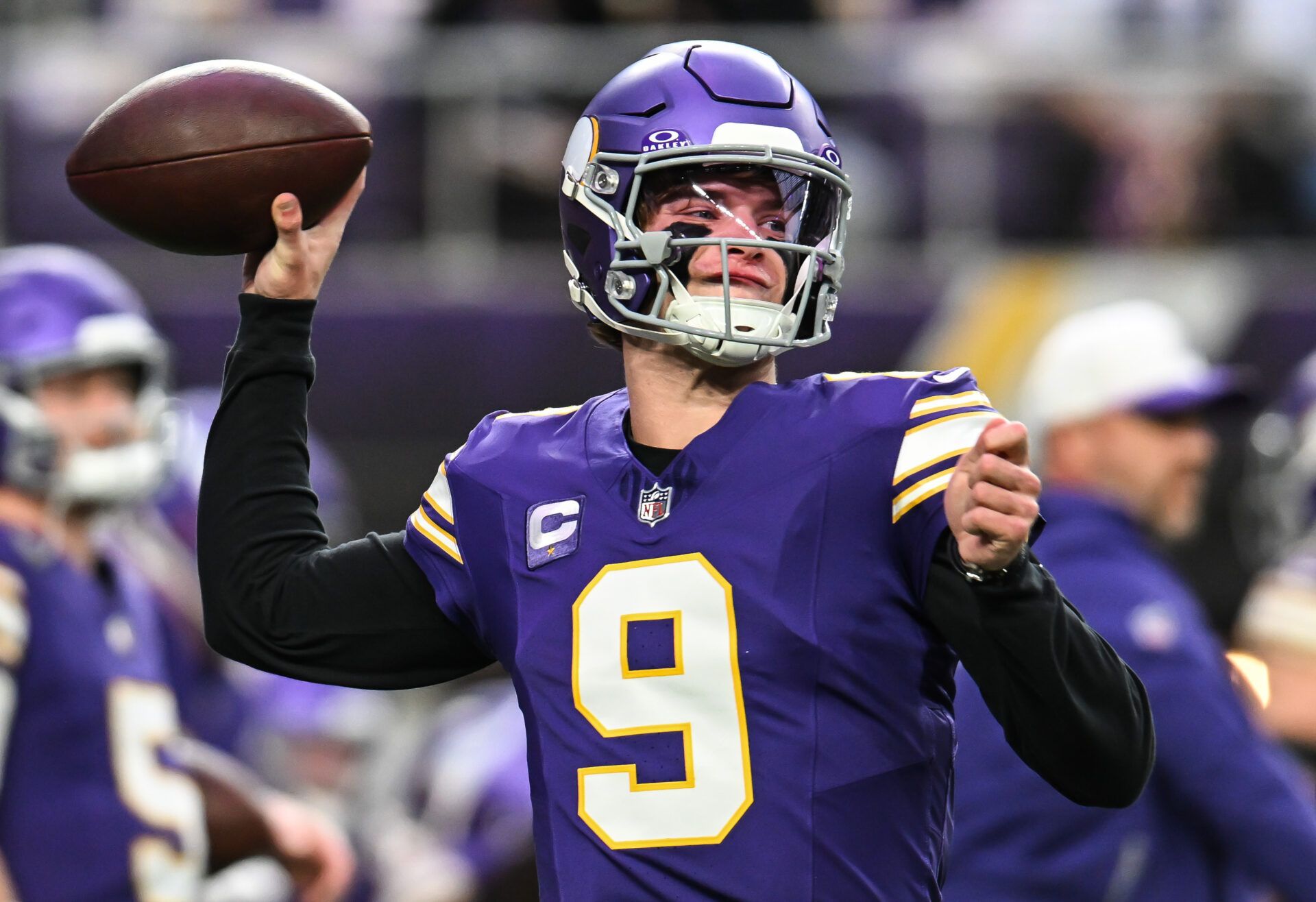 Minnesota Vikings quarterback J.J. McCarthy (9) warms up prior to the game against the Green Bay Packers at U.S. Bank Stadium.