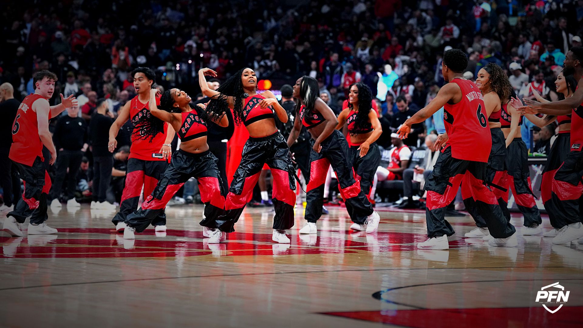 Members of the Toronto Raptors Nortside Crew perform against the Cleveland Cavaliers during a time out in the first quarter during game six of the first round of the 2026 NBA Playoffs at Scotiabank Arena.