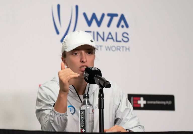 Iga Swiatek (POL) speaks during a press conference after defeating Coco Gauff (USA) on day six of the WTA Finals at Dickies Arena.