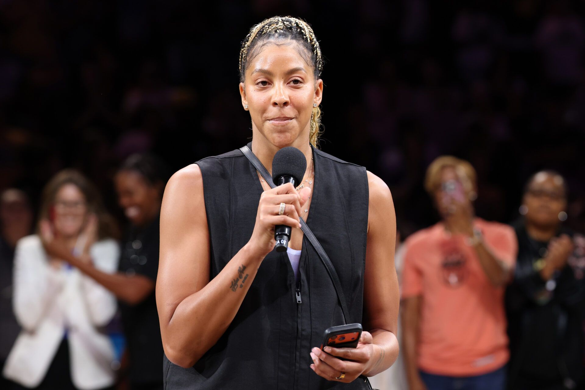Candace Parker speaks during DeLisha Milton-Jone's jersey retirement ceremony during halftime of the game between the New York Liberty andLos Angeles Sparks at Crypto.com Arena.