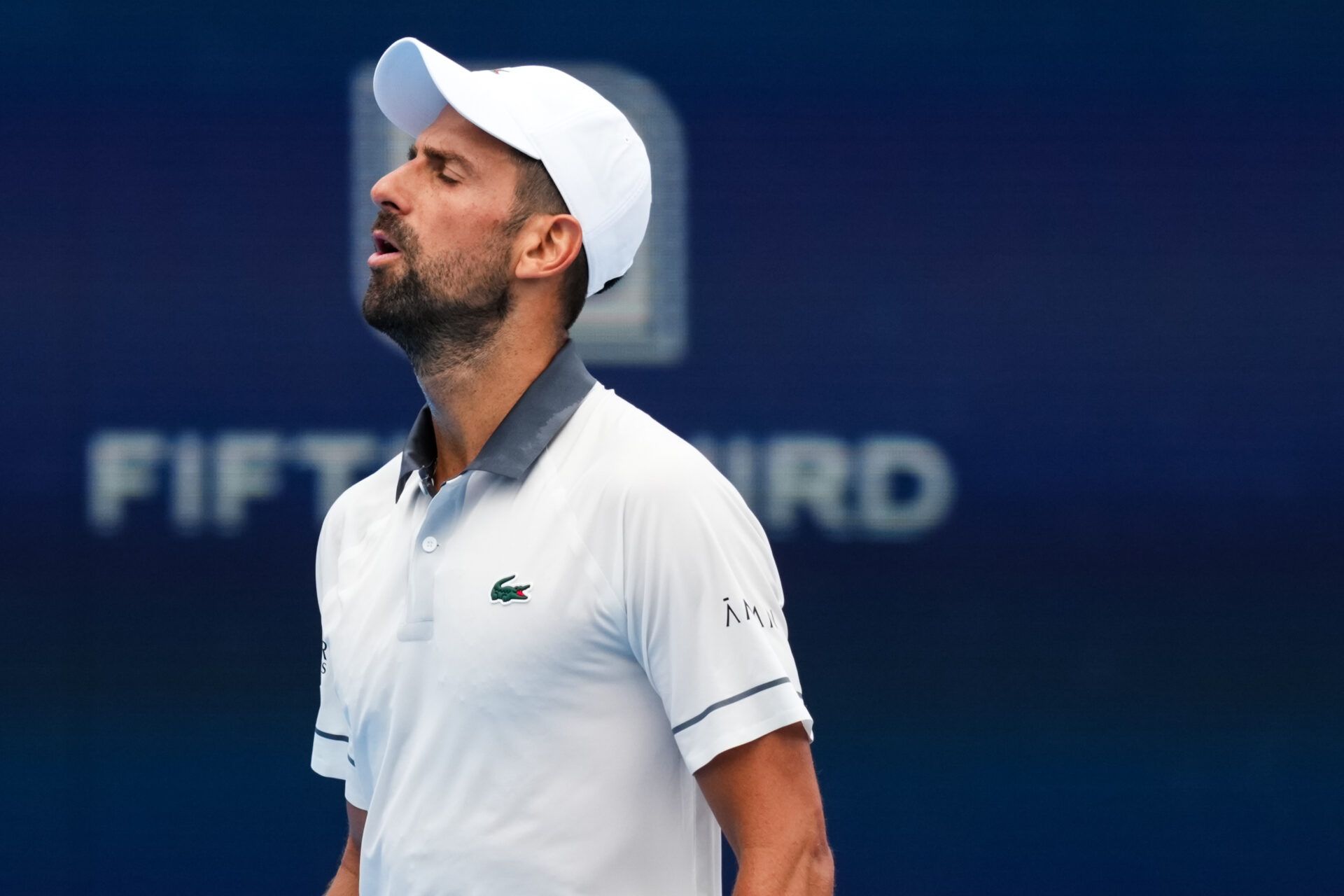 Novak Djokovic (SRB) reacts after returning a shot against Thiago Agustín Tirante (ARG) during the Cincinnati Open at Lindner Family Tennis Center.