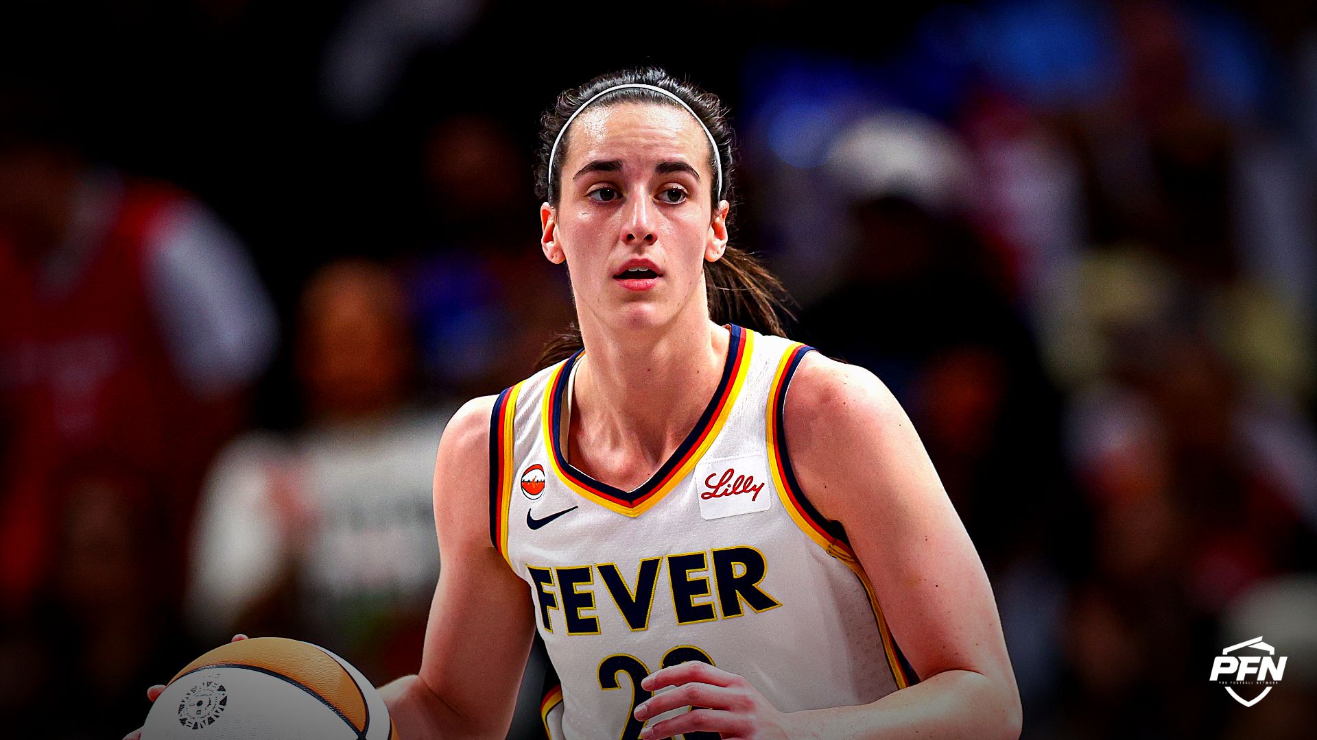 Indiana Fever guard Caitlin Clark (22) dribbles against the Atlanta Dream during the first quarter at State Farm Arena.